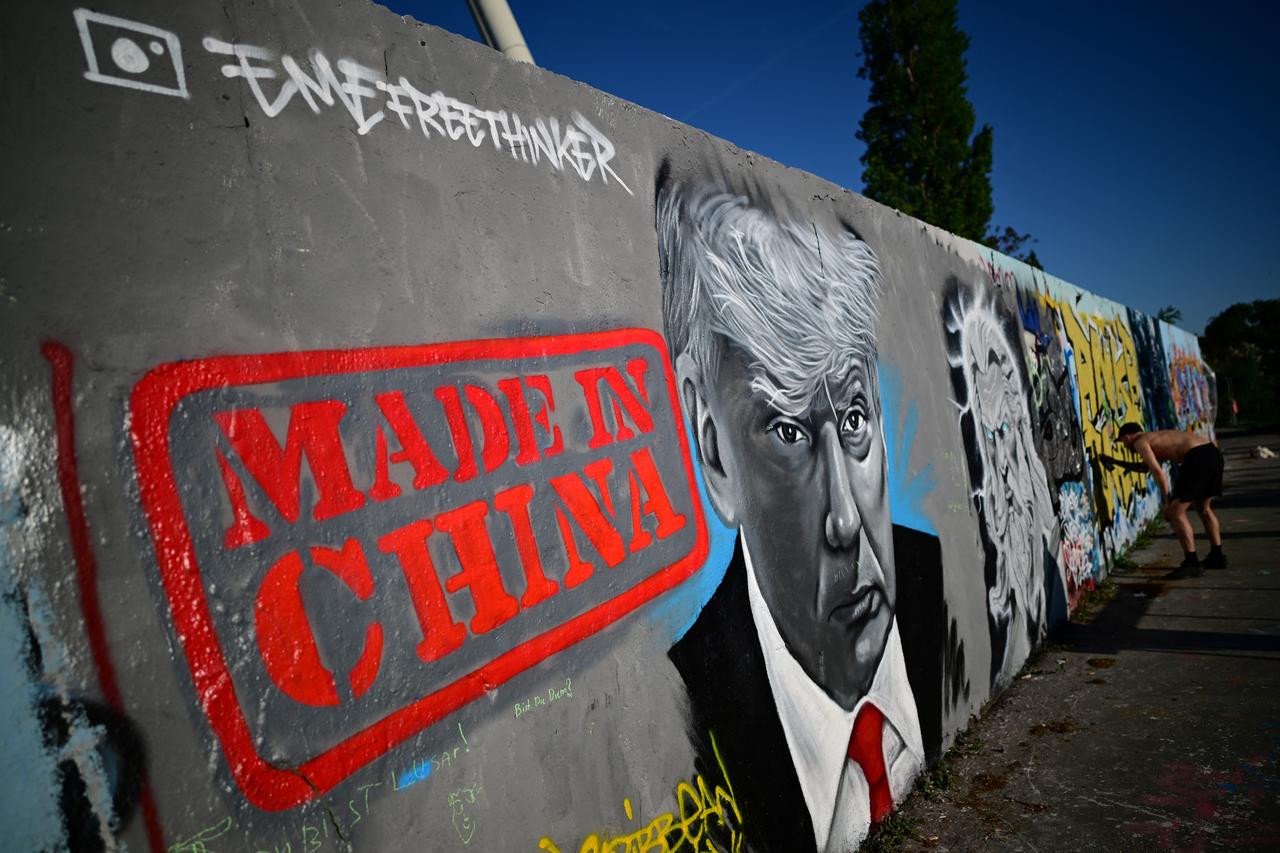  A mural by Berlin-based graffitti artist Eme Freethinker of US President Donald Trump and the lettering reading 'Made in China' is pictured on a wall at the Mauerpark public park in Berlin, Germany on April 26, 2025. (AFP Photo)