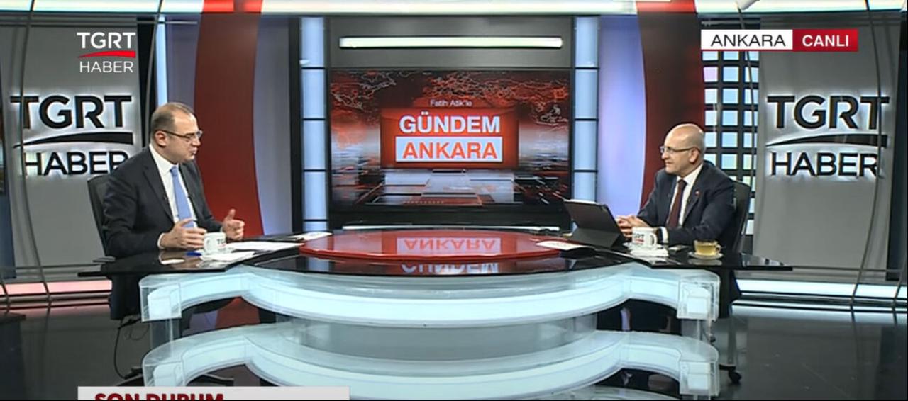 Treasury and Finance Minister Mehmet Simsek (right) speaks during a live broadcast on Turkish TGRT Haber in Ankara, Türkiye, on May 5, 2025. (Photo via turkiyegazetesi.com.tr)