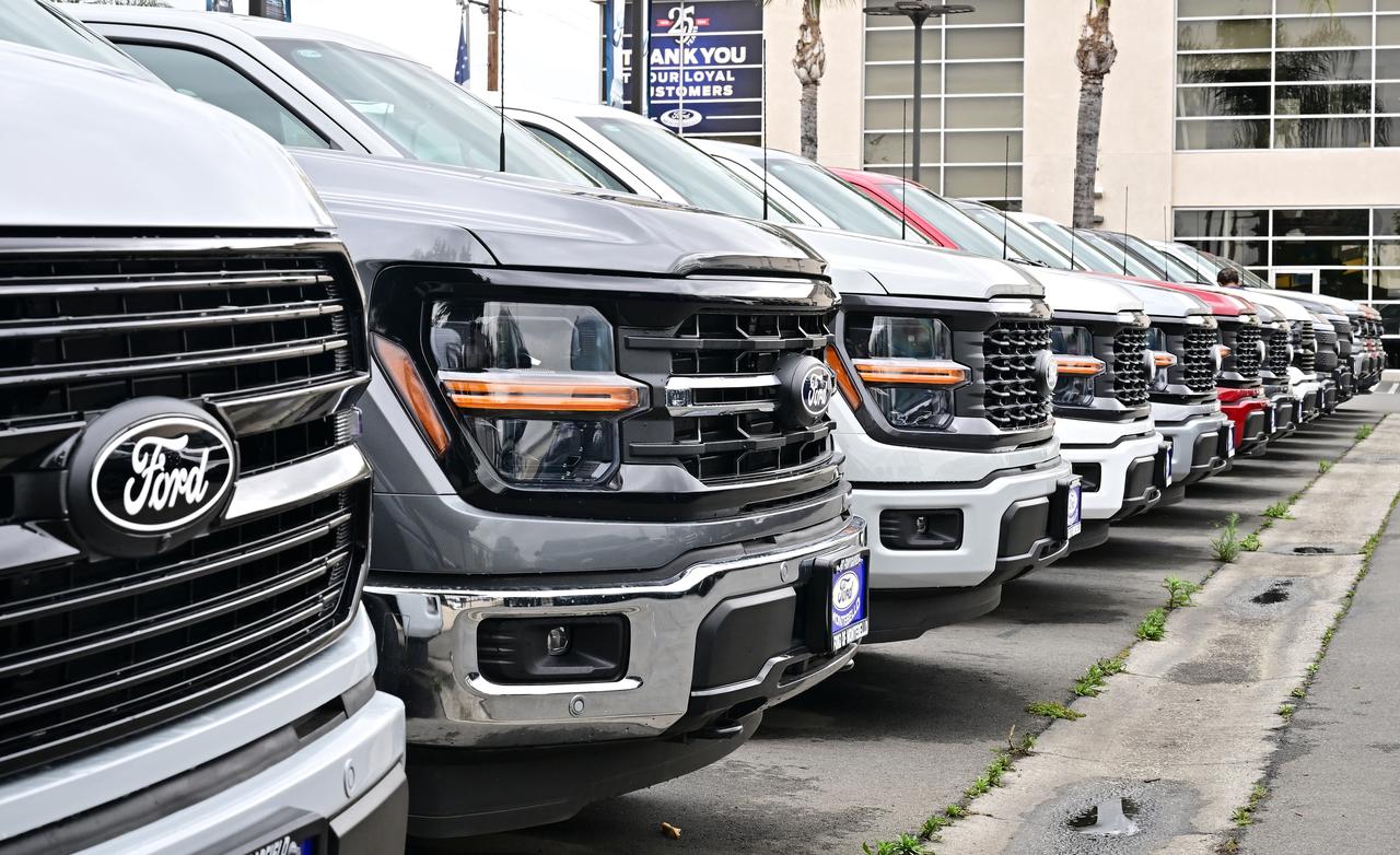 Ford trucks are seen at a car dealership in Montebello, California on May 5, 2025. (AFP Photo)