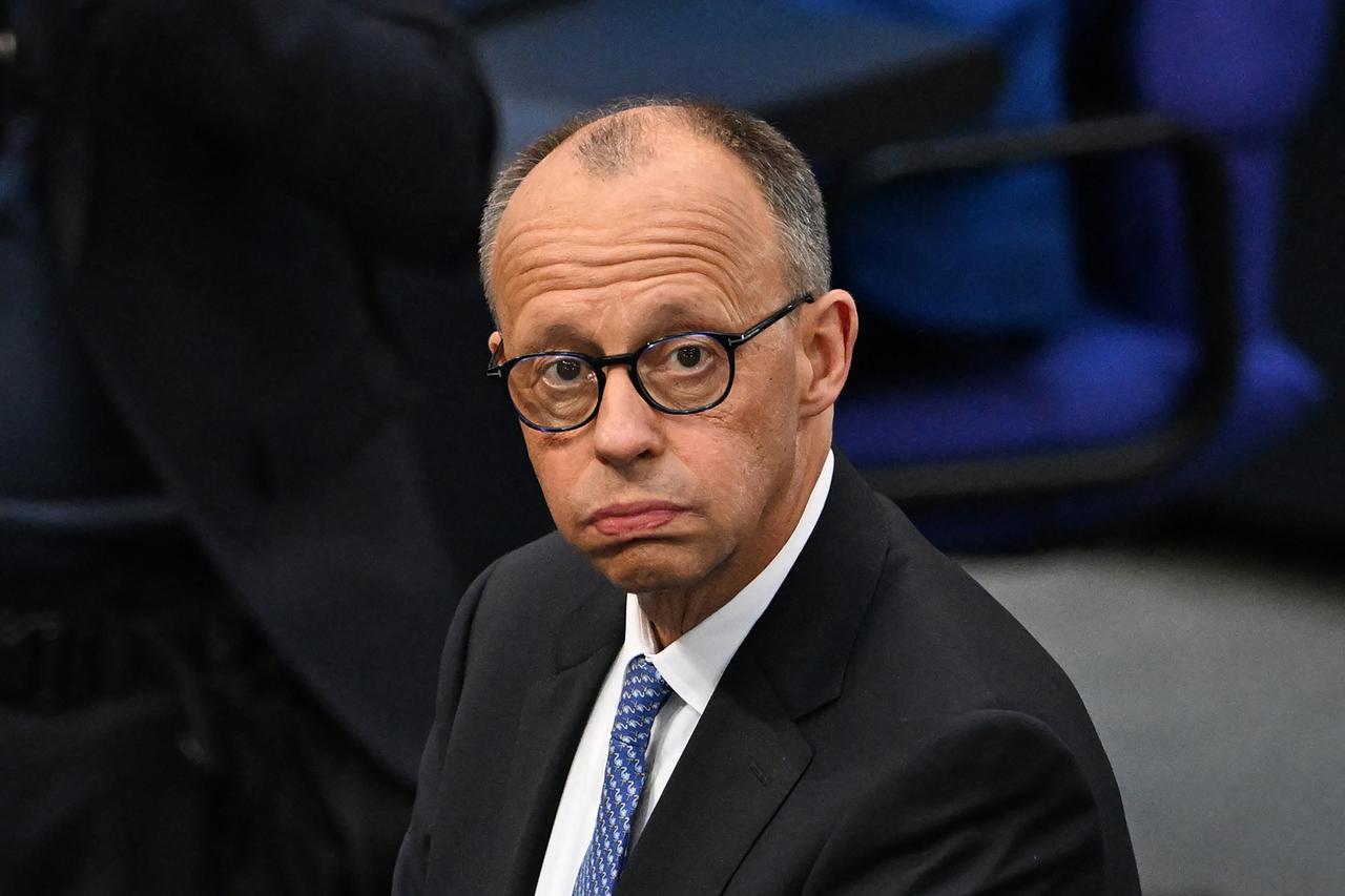 Designated German Chancellor Friedrich Merz reacts as he arrives at the plenary hall for the continuation of a session at the Bundestag (lower house of parliament), as MPs are to elect Germanys next Chancellor, in Berlin, on May 6, 2025. (AFP Photo)