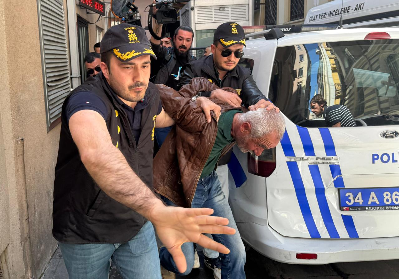 The suspect S.T. being taken into custody by Turkish police after attacking main opposition party CHP's leader Ozgur Ozel in Istanbul, Türkiye on May 4, 2025. (AA Photo)