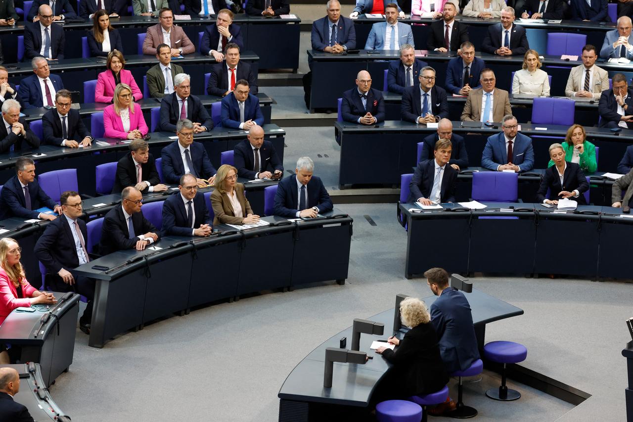 Designated German Chancellor Friedrich Merz reacts to the result of the first round of vote at a session at the Bundestag (lower house of parliament) where the parliament is to elect the Germanys next Chancellor, in Berlin on May 6, 2025. Merz fails to reach majority in first parliament vote. (Photo by RALF HIRSCHBERGER / AFP)