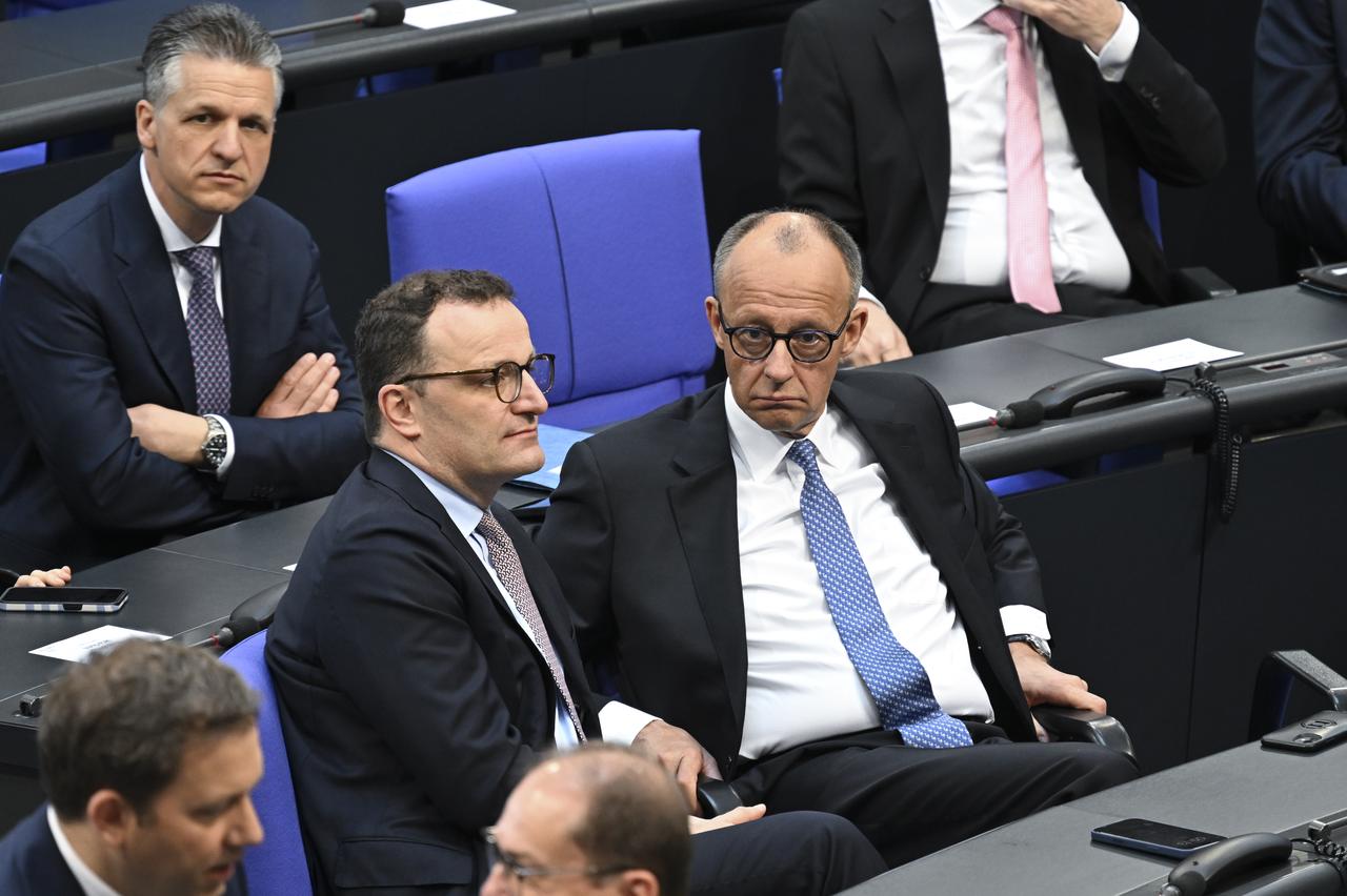 Designated German Chancellor Friedrich Merz reacts to the result of the first round of vote at a session at the Bundestag (lower house of parliament) where the parliament is to elect the Germanys next Chancellor, in Berlin on May 6, 2025. Merz fails to reach majority in first parliament vote. (Photo by RALF HIRSCHBERGER / AFP)