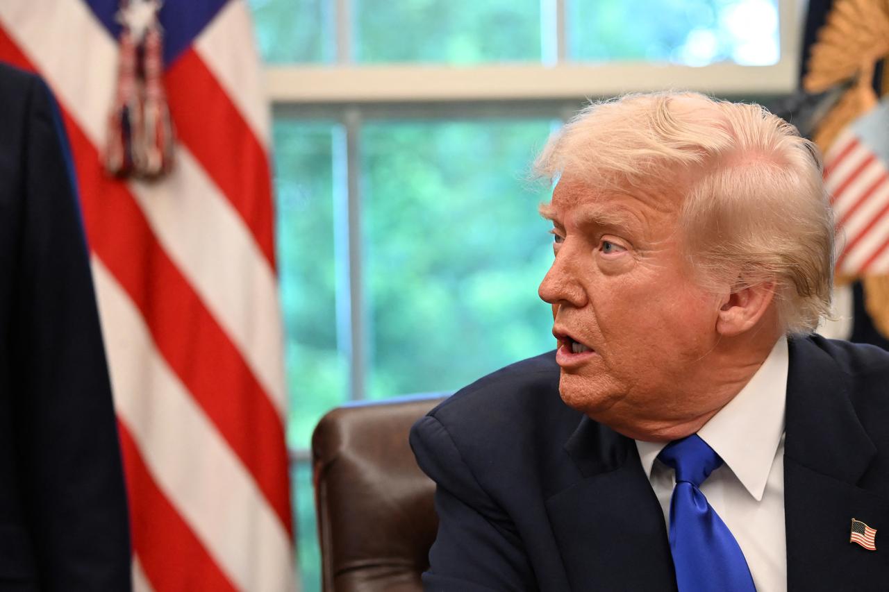US President Donald Trump speaks to the media while signing executive orders in the Oval Office of the White House, in Washington, DC, on May 5, 2025. (AFP Photo)
