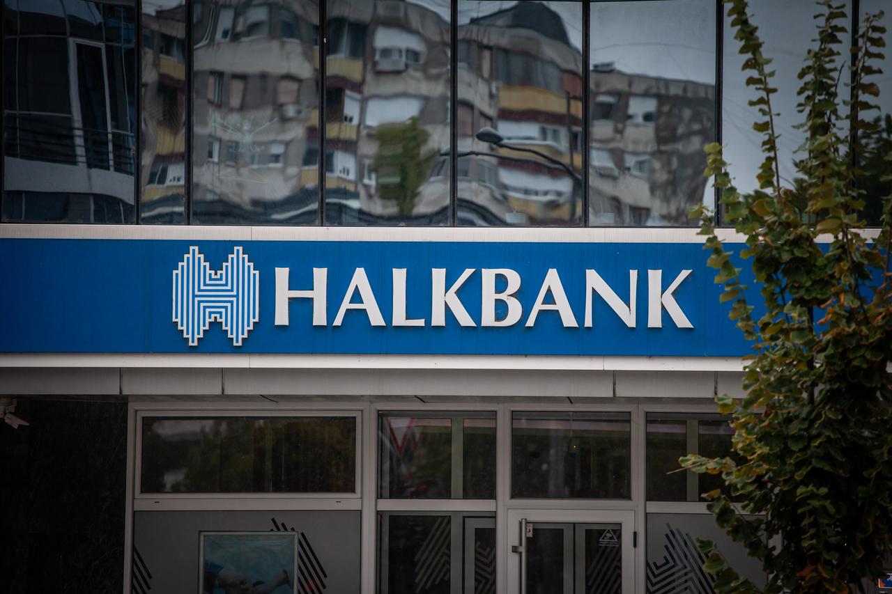 The Halkbank logo is seen on the facade of a branch office in Belgrade, Serbia on September 21, 2024. (Adobe Stock Photo)