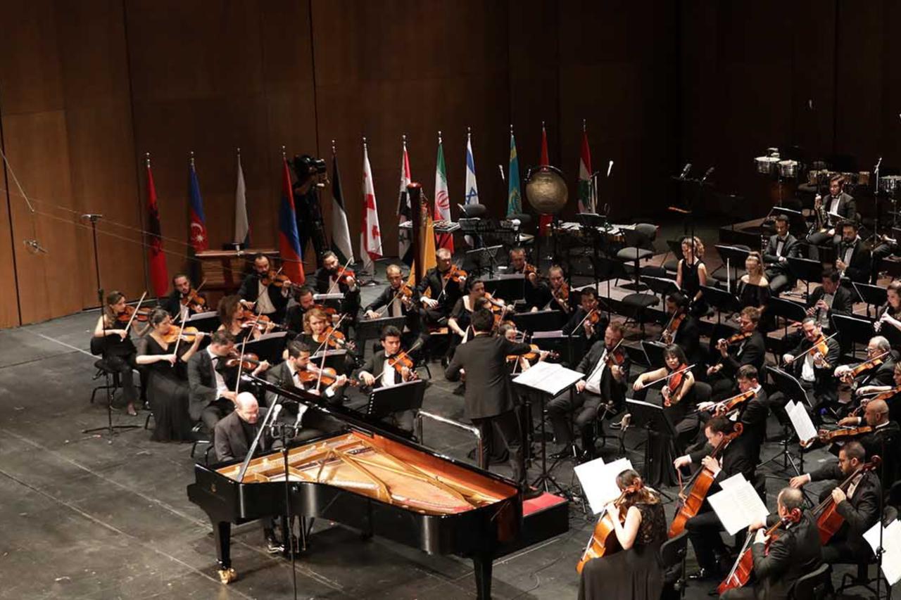 The Borusan Istanbul Philharmonic Orchestra and the State Polyphonic Choir of Türkiye prepare for a joint performance at the Istanbul Music Festival in Türkiye, accessed on May 7, 2025. (Photo via iksv.org)