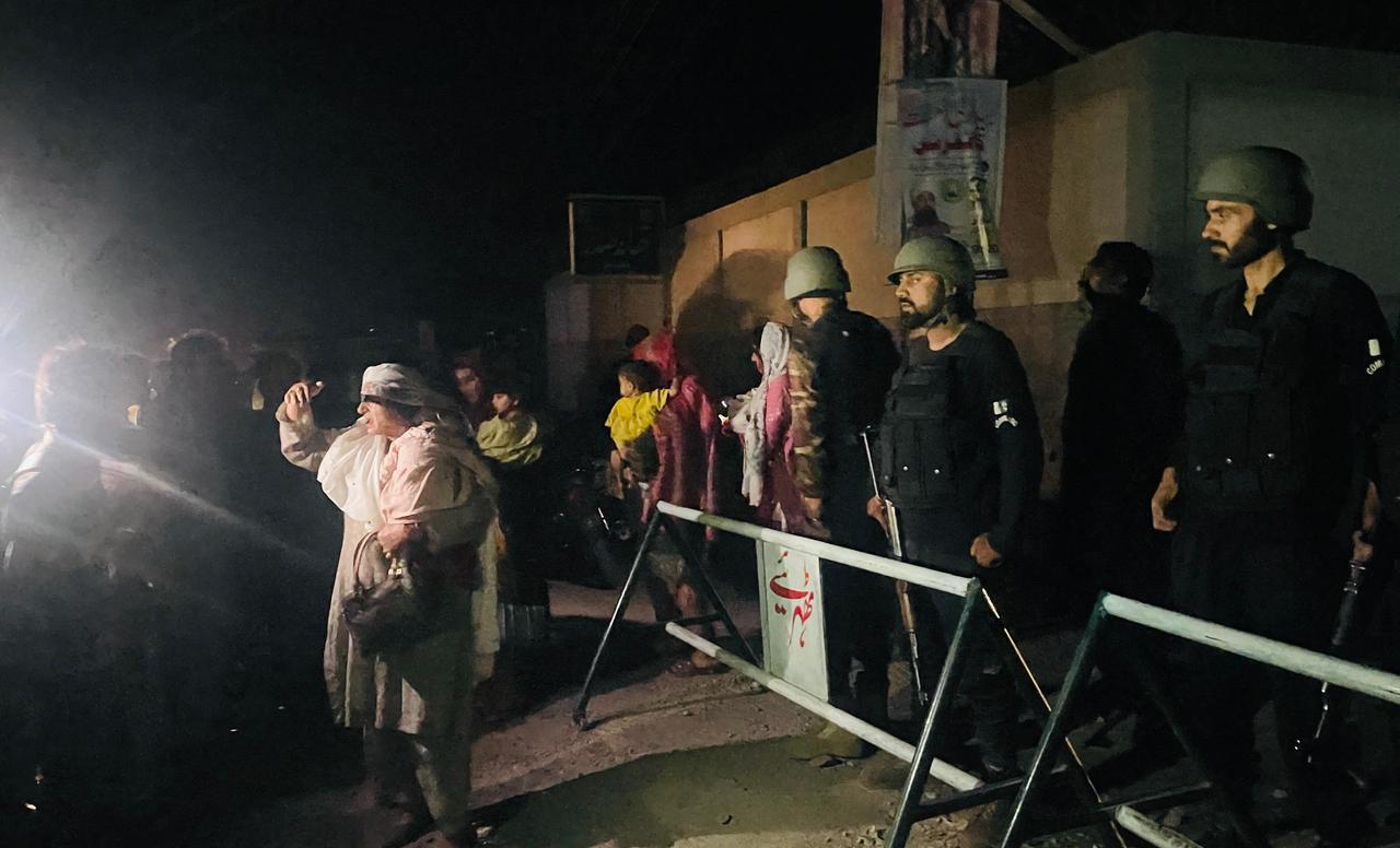 Security personnel cordon-off a street as local residents evacuate their homes near the site of a strike in Muzaffarabad, the capital of Pakistan-administered Kashmir, on May 7, 2025. (AFP Photo)