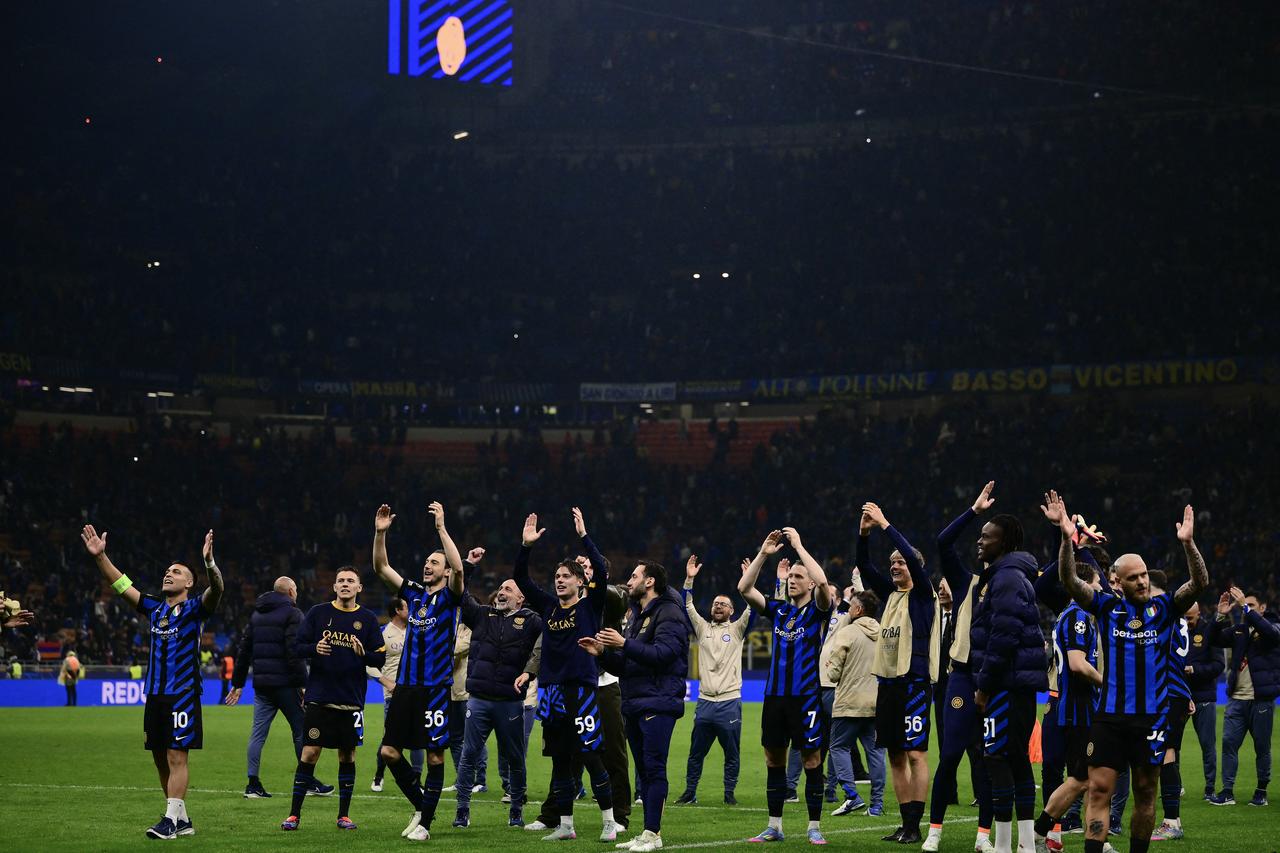 Inter Milan's players celebrate their win at the end of the UEFA Champions League semi-final second leg football match between Inter Milan and FC Barcelona at the San Siro stadium in Milan, Italy on May 6, 2025. (AFP Photo)