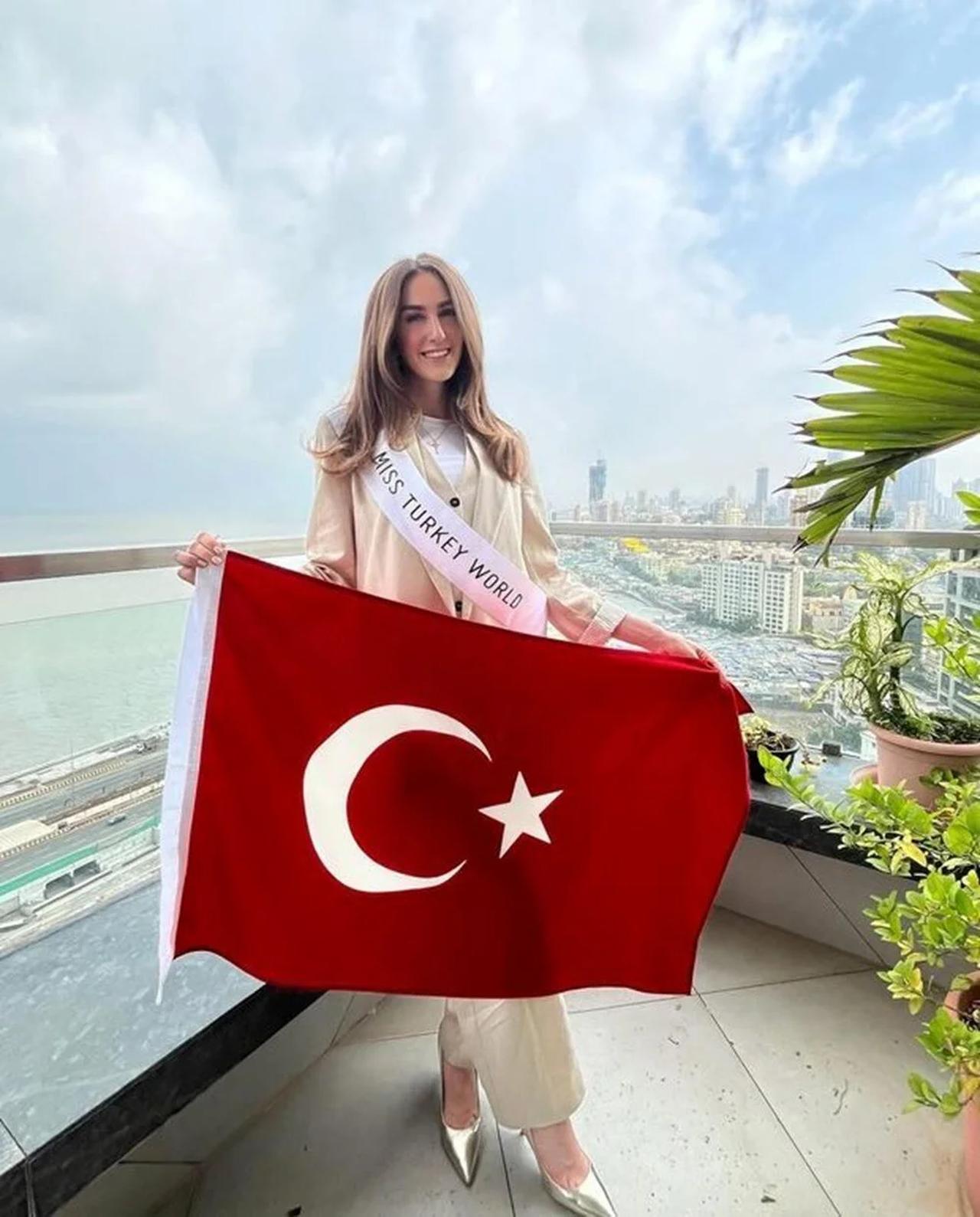 Miss Türkiye 2024 Idil Bilgen poses for photo holding Turkish flag in Mumbai, India, May 7, 2025. (Photo via Instagram / @idil.bilgen)