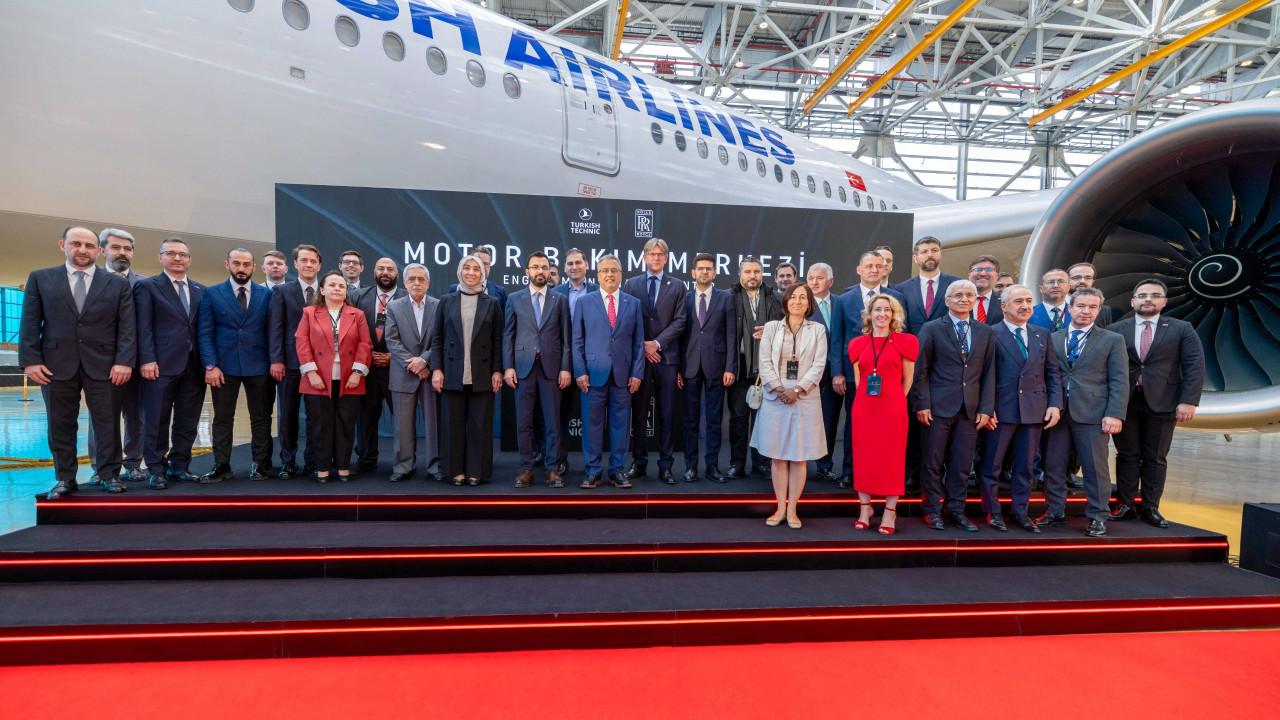 Executives and officials from Turkish Technic and Rolls-Royce pose in front of a Turkish Airlines aircraft during the signing ceremony for the new engine maintenance center in Istanbul, Türkiye, on May 6, 2025. (Photo via dunya.com)
