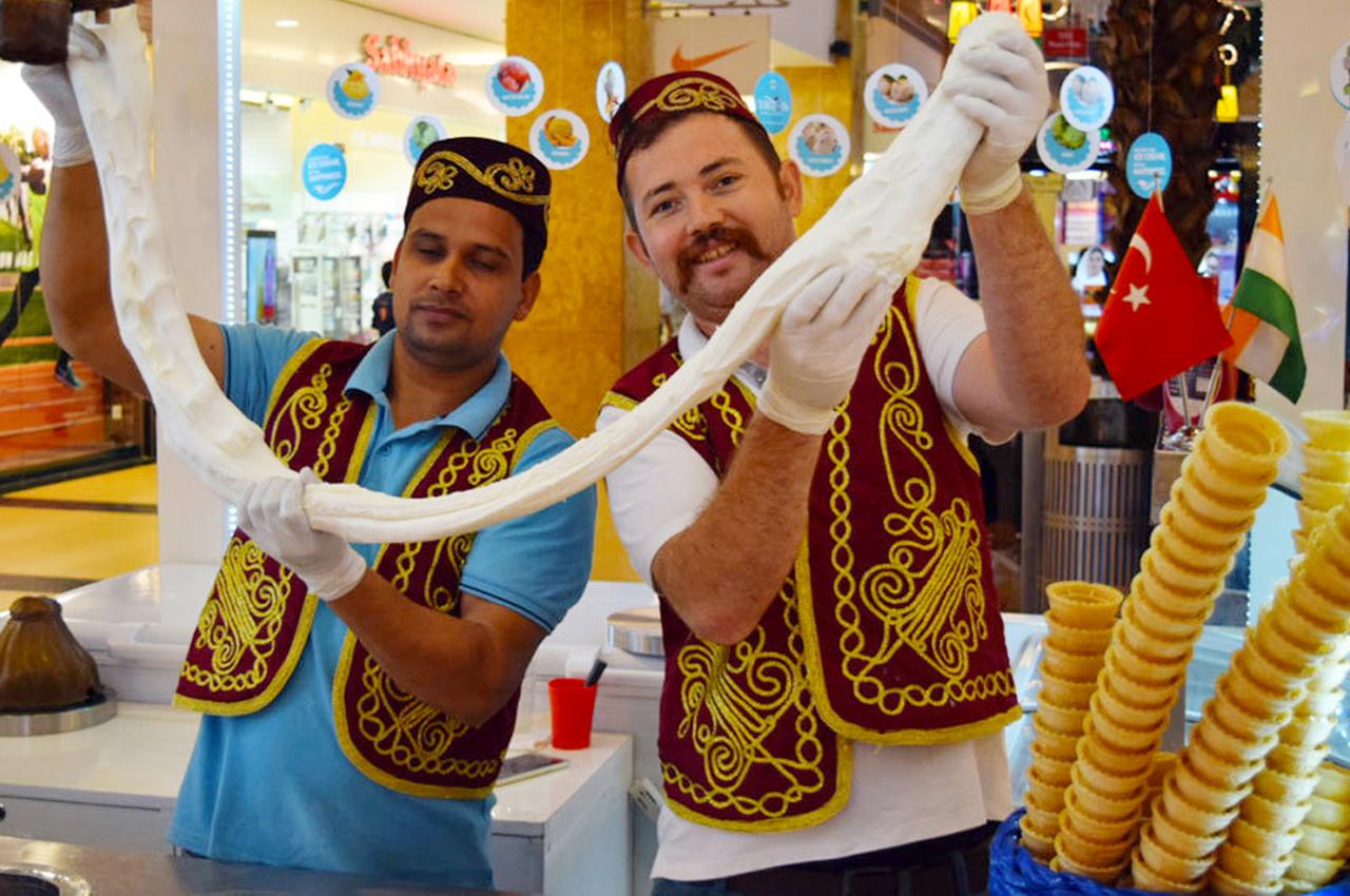 Ice cream vendors hold traditional Maras ice cream, famous for its flexibility, Feb. 5, 2022. (Photo via fethiyepropertyworld.com)