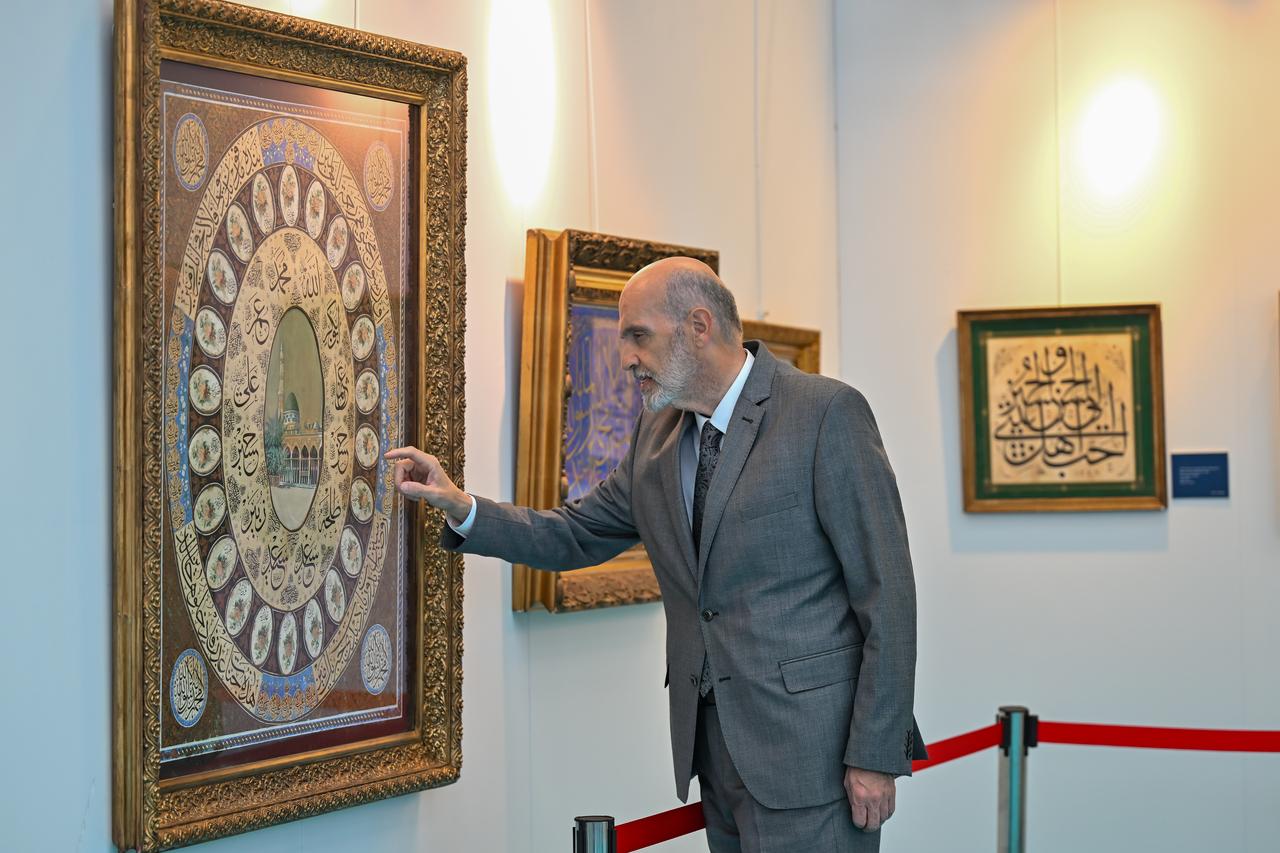 Calligraphy works from Yildiz Holding's Islamic Art Collection are on display in Türkiye at the “Famous Calligraphers in the Flow of History” exhibition, part of the first International Islamic Arts Fair held in Ankara, May 7, 2025. (AA Photo)