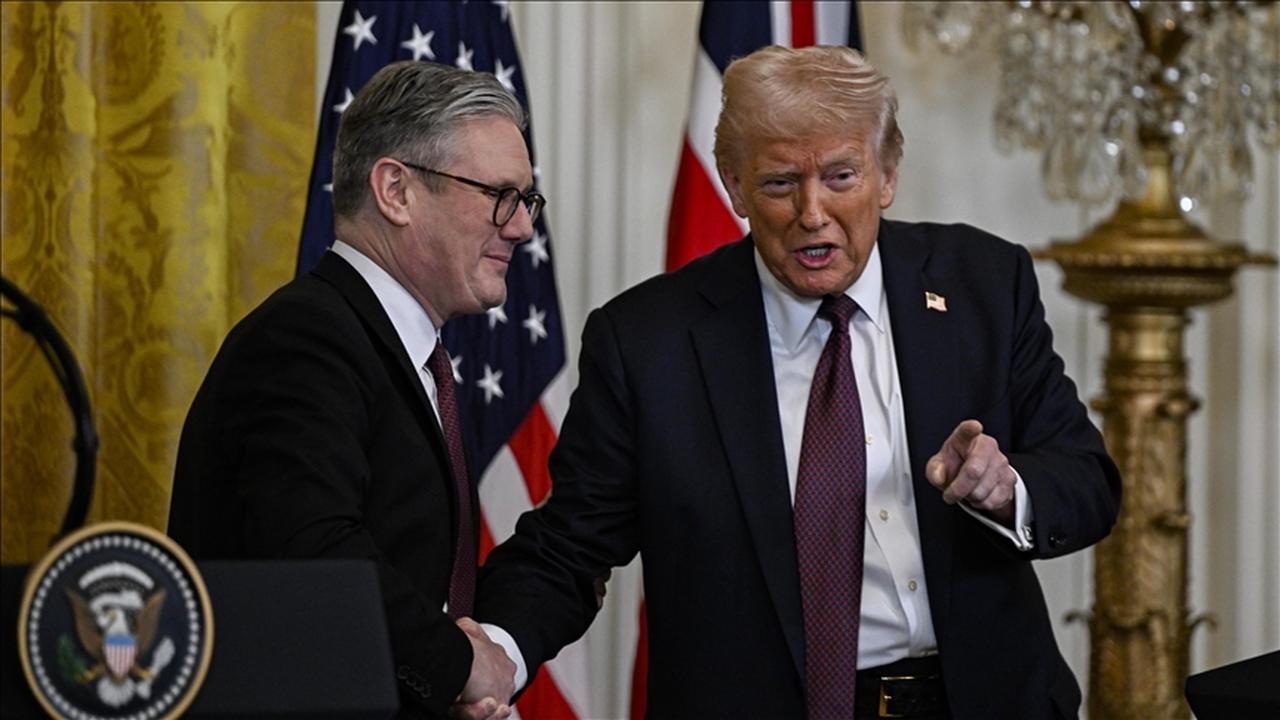 U.S. President Donald Trump shakes hands with UK Prime Minister Keir Starmer during a joint event in Washington, D.C., on May 8, 2025. (AA Photo)