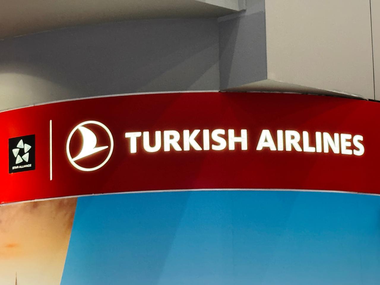 The Turkish Airlines logo is displayed at an airport terminal in Istanbul, Türkiye, on October 4, 2024. (Adobe Stock Photo)