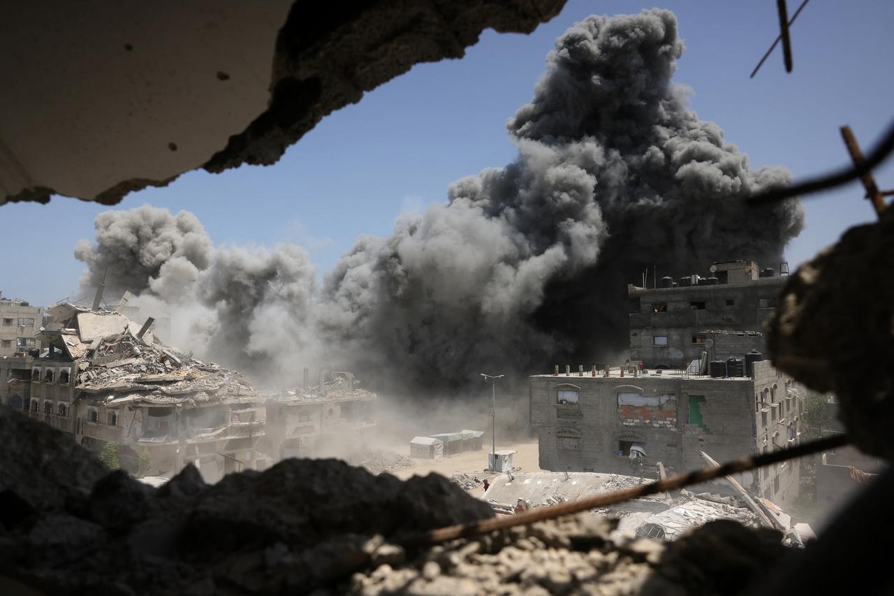 Smoke and debris rise following an Israeli strike on a house west of Jabalia, in the northern Gaza Strip, on June 1, 2025. (AFP Photo)