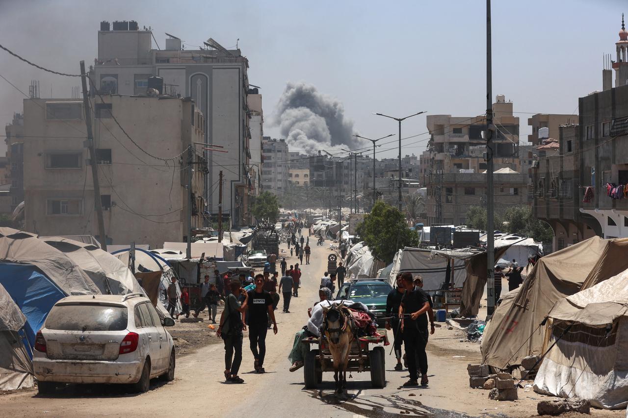 Smoke billows following Israeli strikes on al-Tuffah neighbourhood in Gaza City on May 31, 2025. Israel on May 30 said the Palestinian Hamas movement must accept a hostage deal in Gaza or  be annihilated , as US President Donald Trump announced that a ceasefire agreement was  very close . (Photo by Omar AL-QATTAA / AFP)