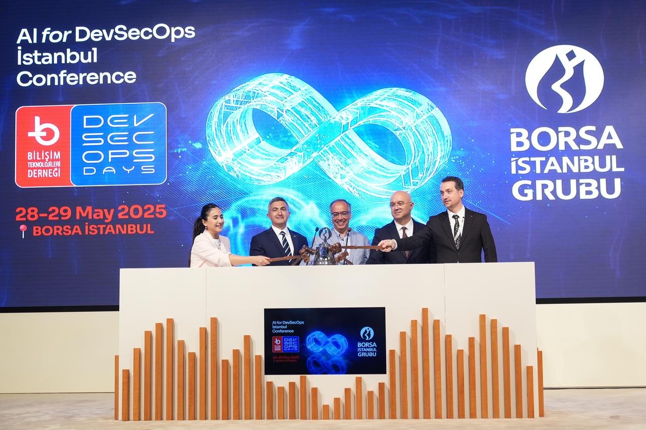 Mehmet Ali Serttas (R), Chairman of the IT Association; Erdinc Tutam (L2), Deputy General Manager of Borsa Istanbul; Taskin Oker (R2), Deputy General Manager of Takasbank; Burcu Dogan Kasaci (R1), Head of Cybersecurity Department at the Ministry of Industry and Technology; and Hasan Yasar (C), from Carnegie Mellon University, ring the opening bell for the DevSecOps Days Istanbul Conference at Borsa Istanbul on May 28, 2025. (AA Photo)