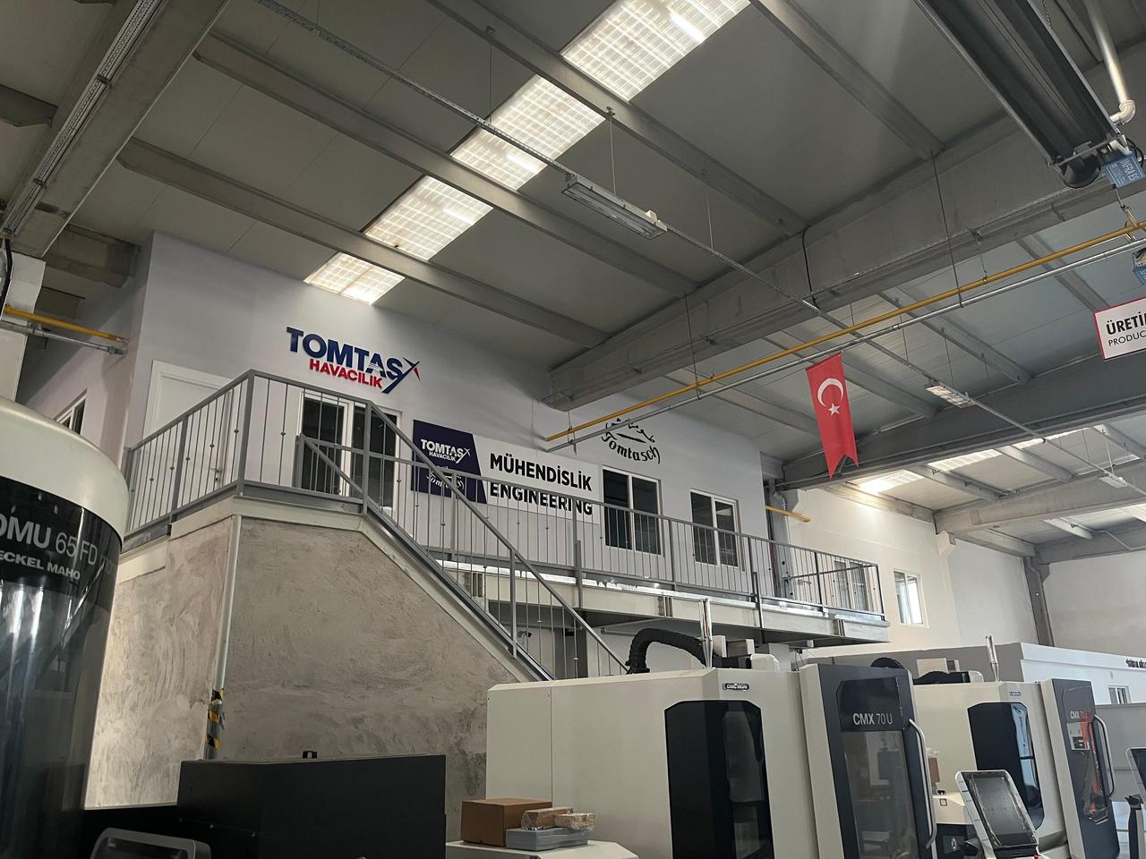 A view from inside the TOMTAS engineering and production building shows the main floor equipped with advanced manufacturing units in Kayseri, Türkiye, on June 1, 2025. (AA Photo)