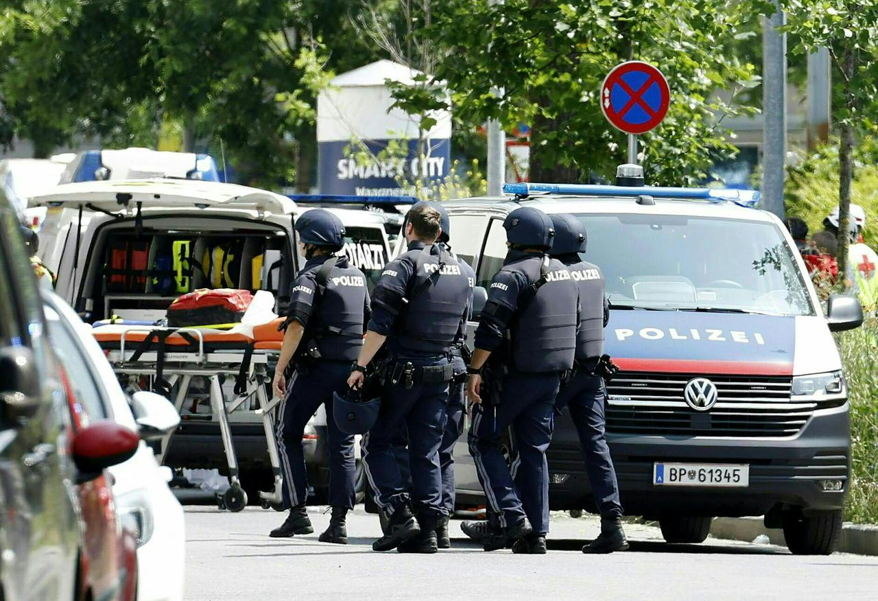 Policemen are seen in a street close to a school where, according to reports, several people died in a shooting, on June 10, 2025 in Graz, southeastern Austria. (AFP Photo)