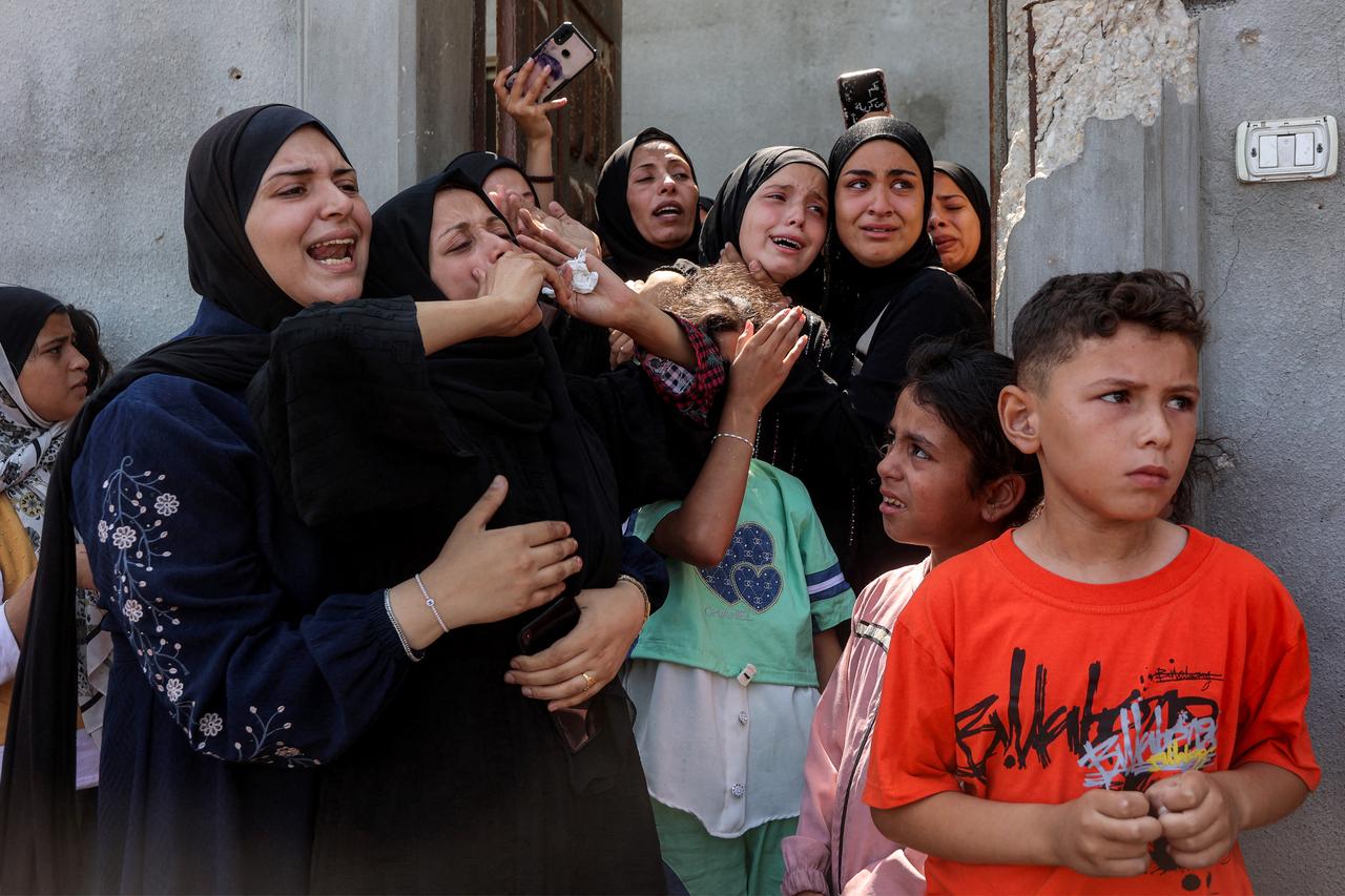 Women mourn during the funeral of Palestinian photojournalist Moamen Abu Alouf, who was killed with three paramedics the previous day by Israeli bombardment on the Tuffah neighbourhood, at his home in the Shati camp in the west of Gaza City on June 10, 2025. (AFP Photo)