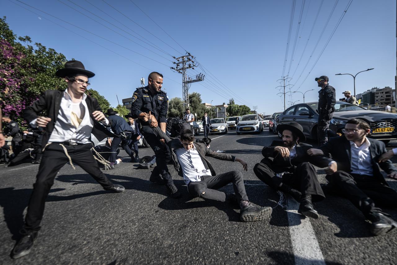 Ultra-Orthodox Jews gather to hold a protest against mandatory military service in the city of Bnei Brak, Israel on June 05, 2025. (AA Photo)