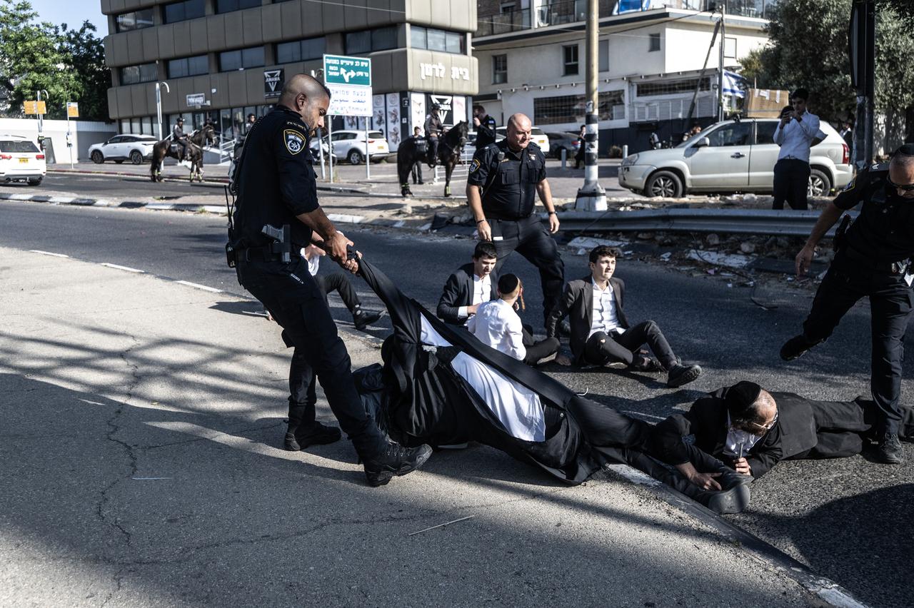 Ultra-Orthodox Jews gather to hold a protest against mandatory military service in the city of Bnei Brak, Israel on June 05, 2025. (AA Photo)