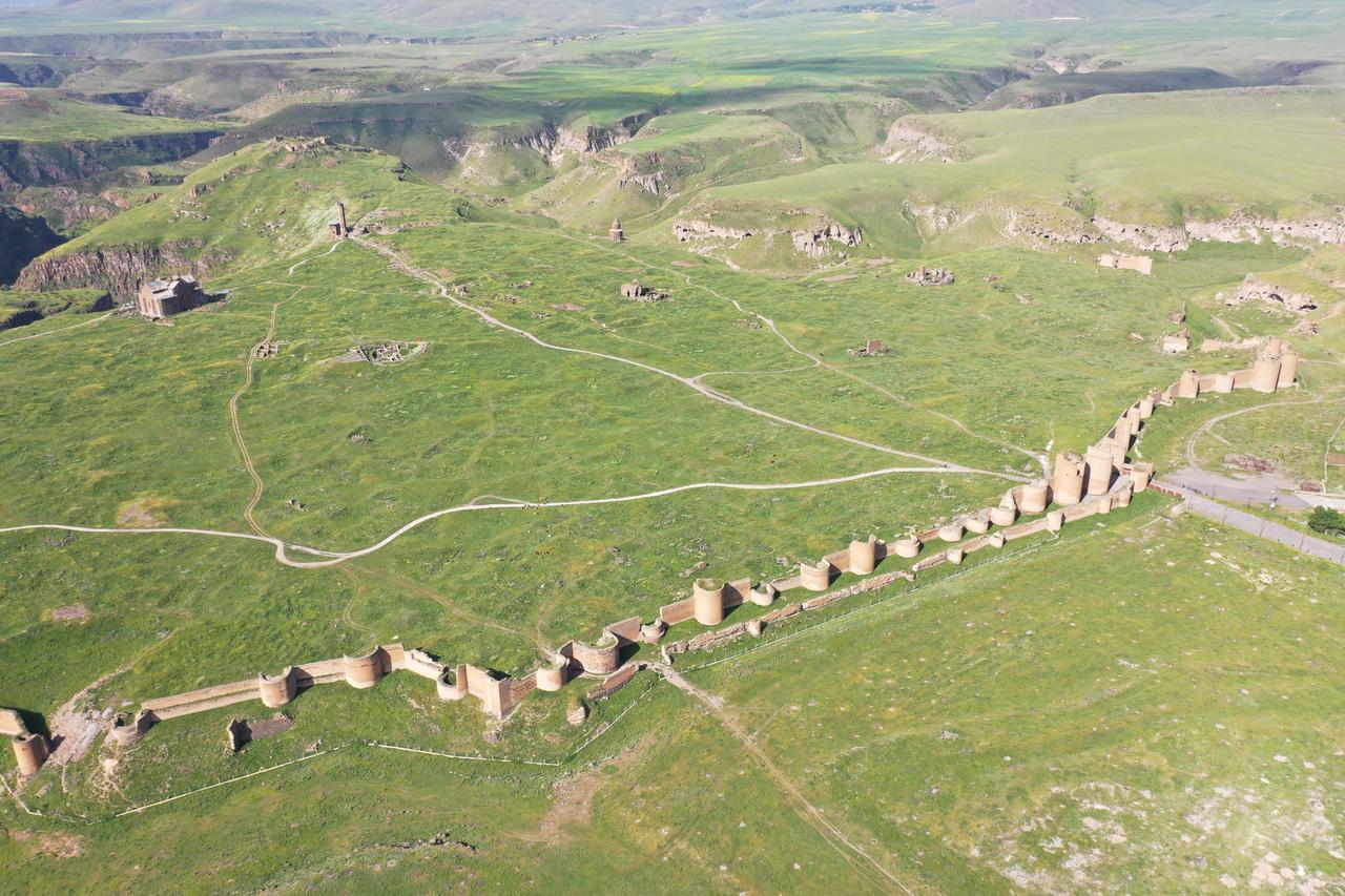An aerial view of the Ani Walls, approximately 5 kilometers of which have stood for over 1,000 years at the historic Ani Ruins, a UNESCO World Heritage Site located in Kars, Türkiye, June 9, 2025. (AA Photo)