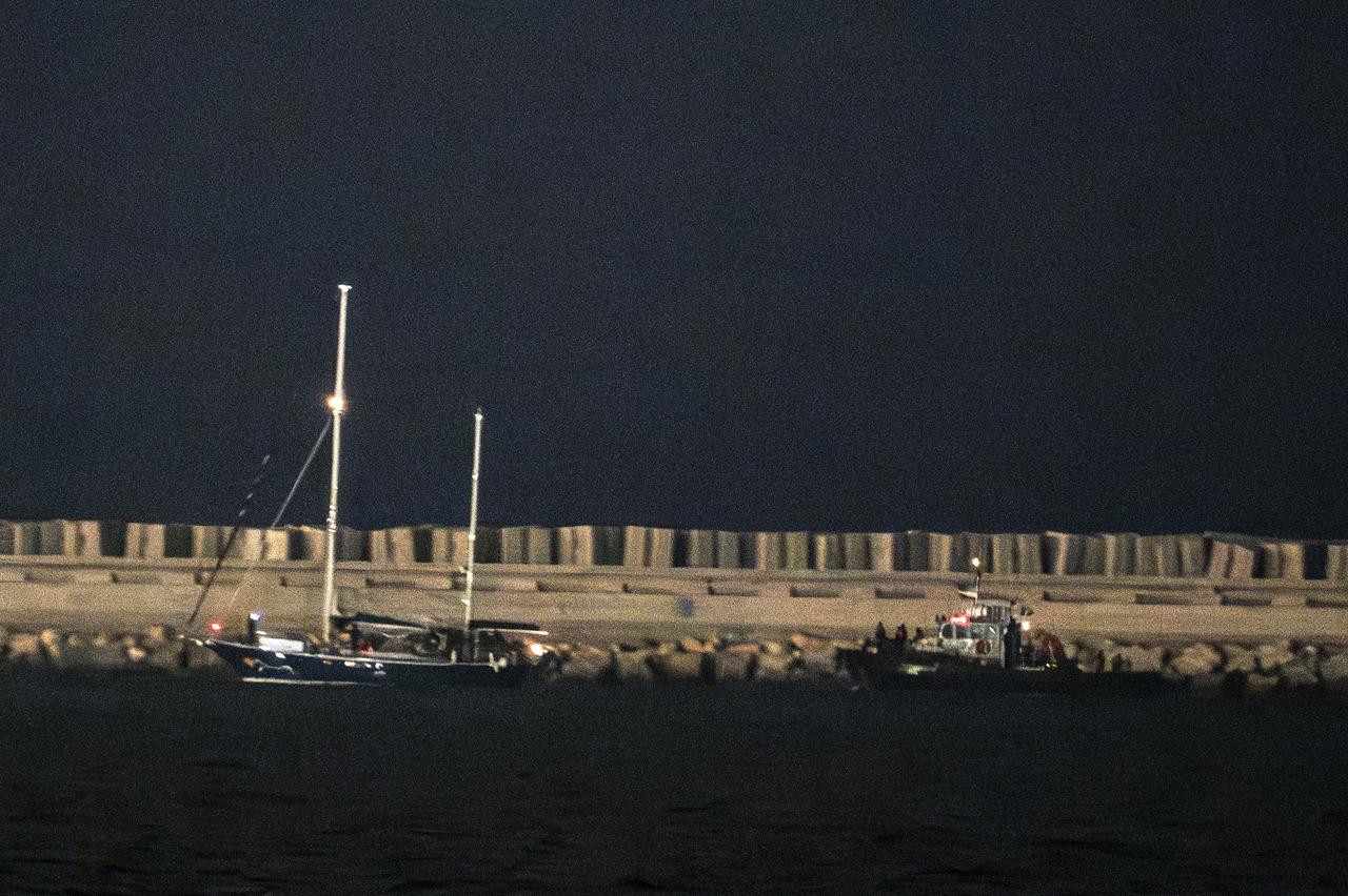 The Madleen aid vessel, which set sail to deliver humanitarian assistance to Gaza and was intercepted overnight by Israeli forces, is being taken to the Ashdod Port on June 09, 2025 in Ashdod, Israel. (AA Photo)