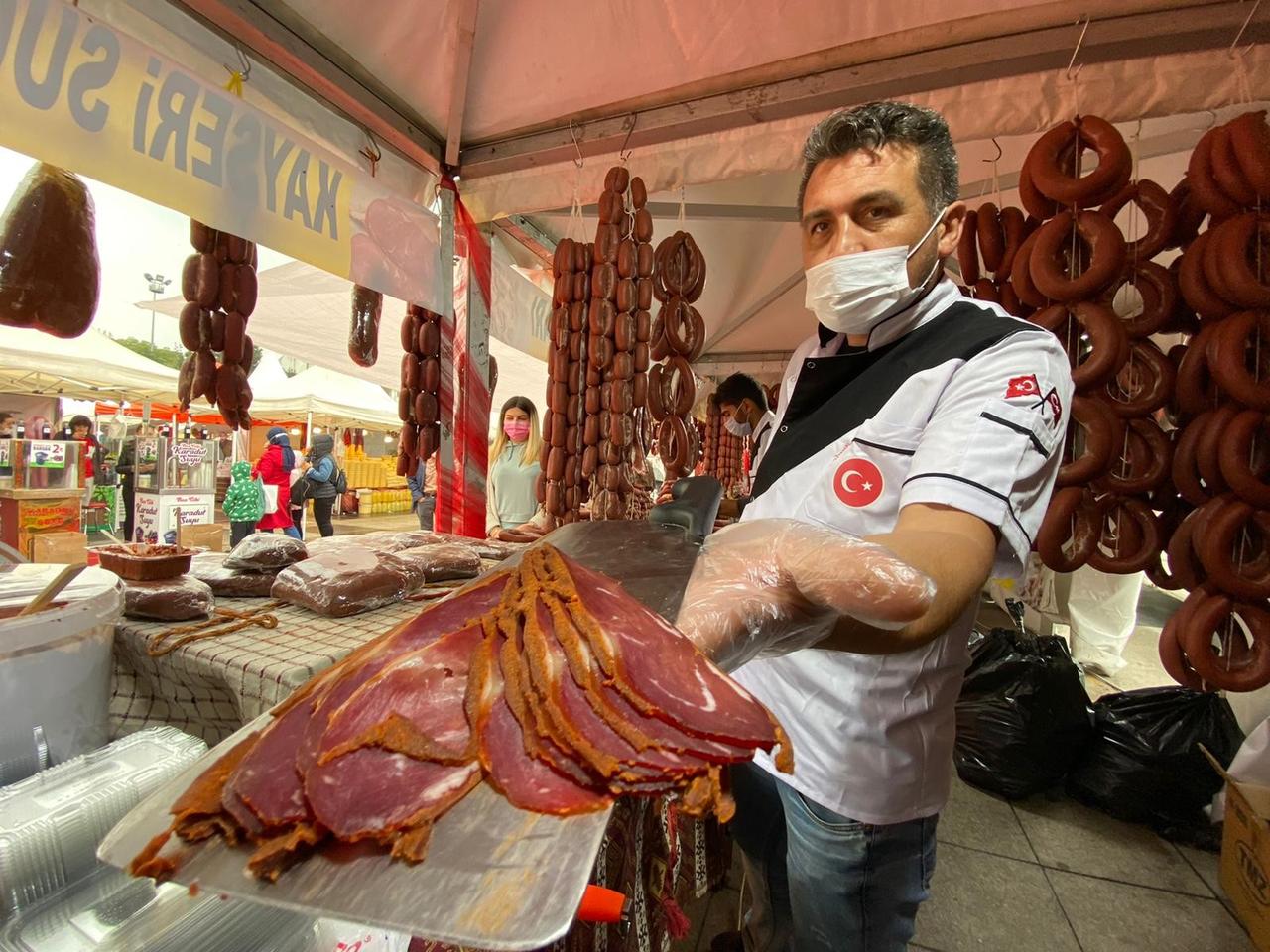 A chef holds a Kayseri's pastirma Turkey, October 25, 2020. (IHA Photo)