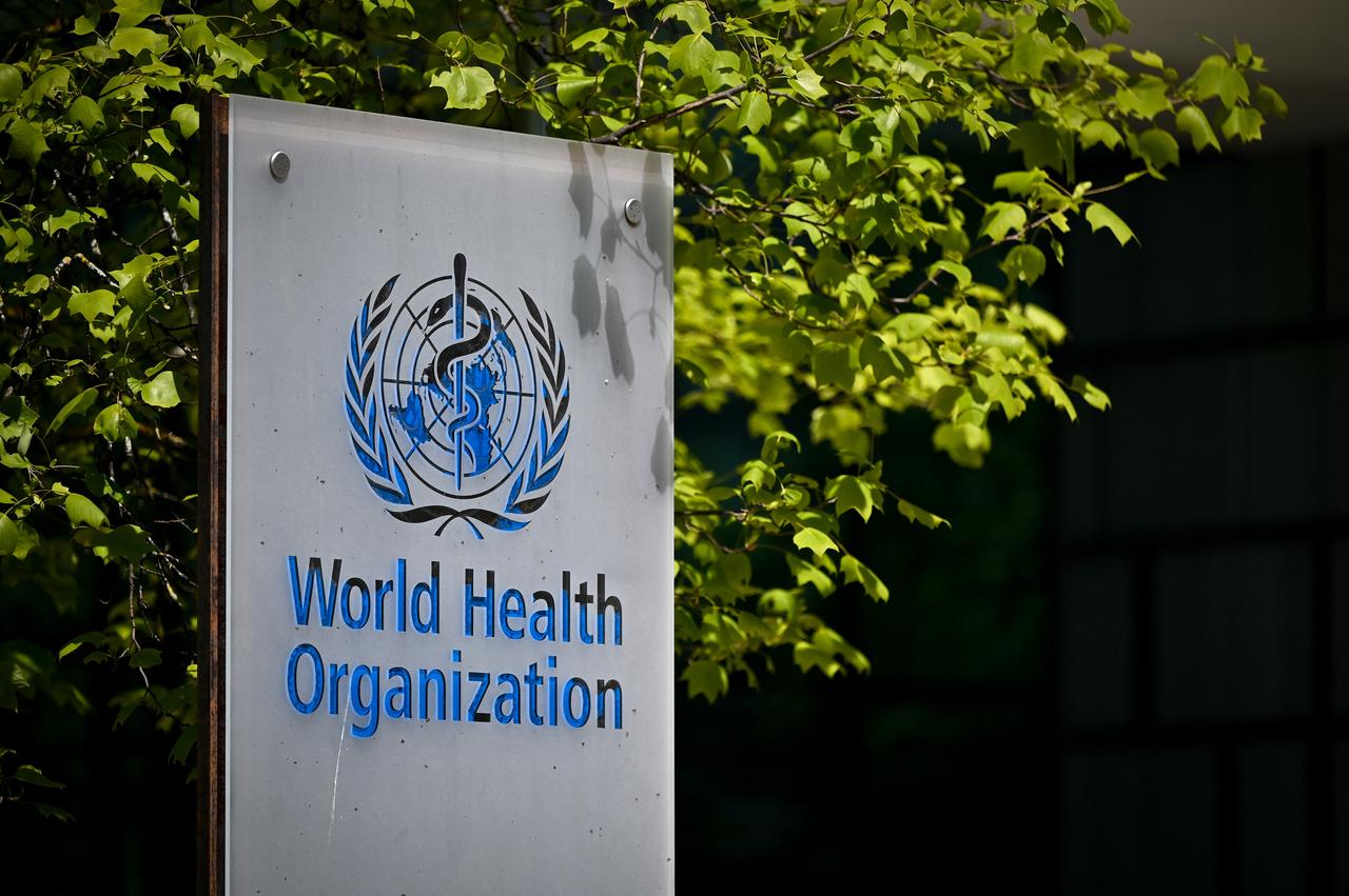 A picture taken on May 8, 2021 shows a sign of the World Health Organization (WHO) at the entrance of their headquarters in Geneva. (AFP Photo)