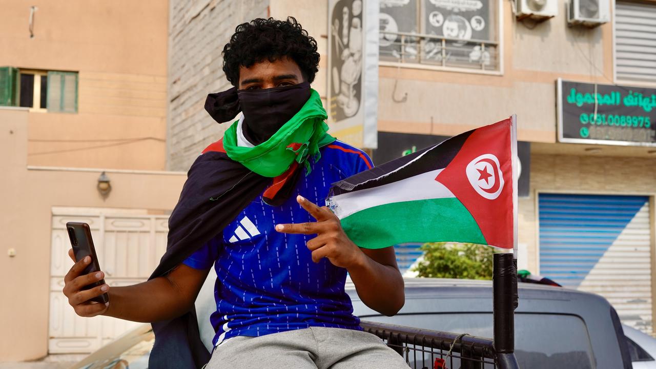 ZLITEN, LIBYA - JUNE 12: Hundreds of residents in Zliten, Libya, see off the Maghreb Resistance Convoy, on June 12, 2025. Streets flood with Libyan and Palestinian flags, while chants demand an end to the Gaza blockade. ( Hazem Turkia - Anadolu Agency )