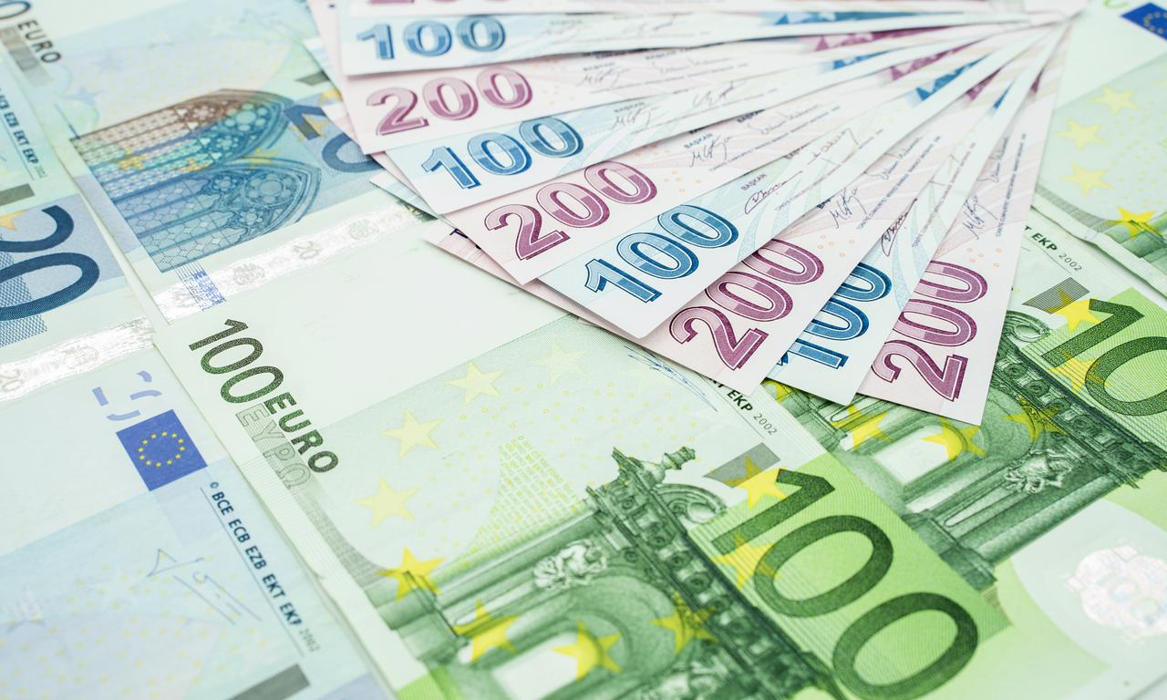 File photo shows Euro banknotes placed next to Turkish lira bills, accessed on June 12, 2025. (Adobe Stock Photo)