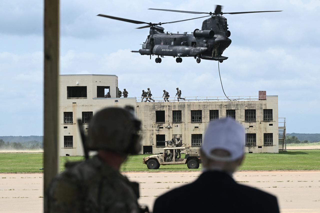 US President Donald Trump watches a military demonstration at Fort Bragg, a US Army military installation, near Fayetteville, North Carolina, on June 10, 2025. (AFP Photo)