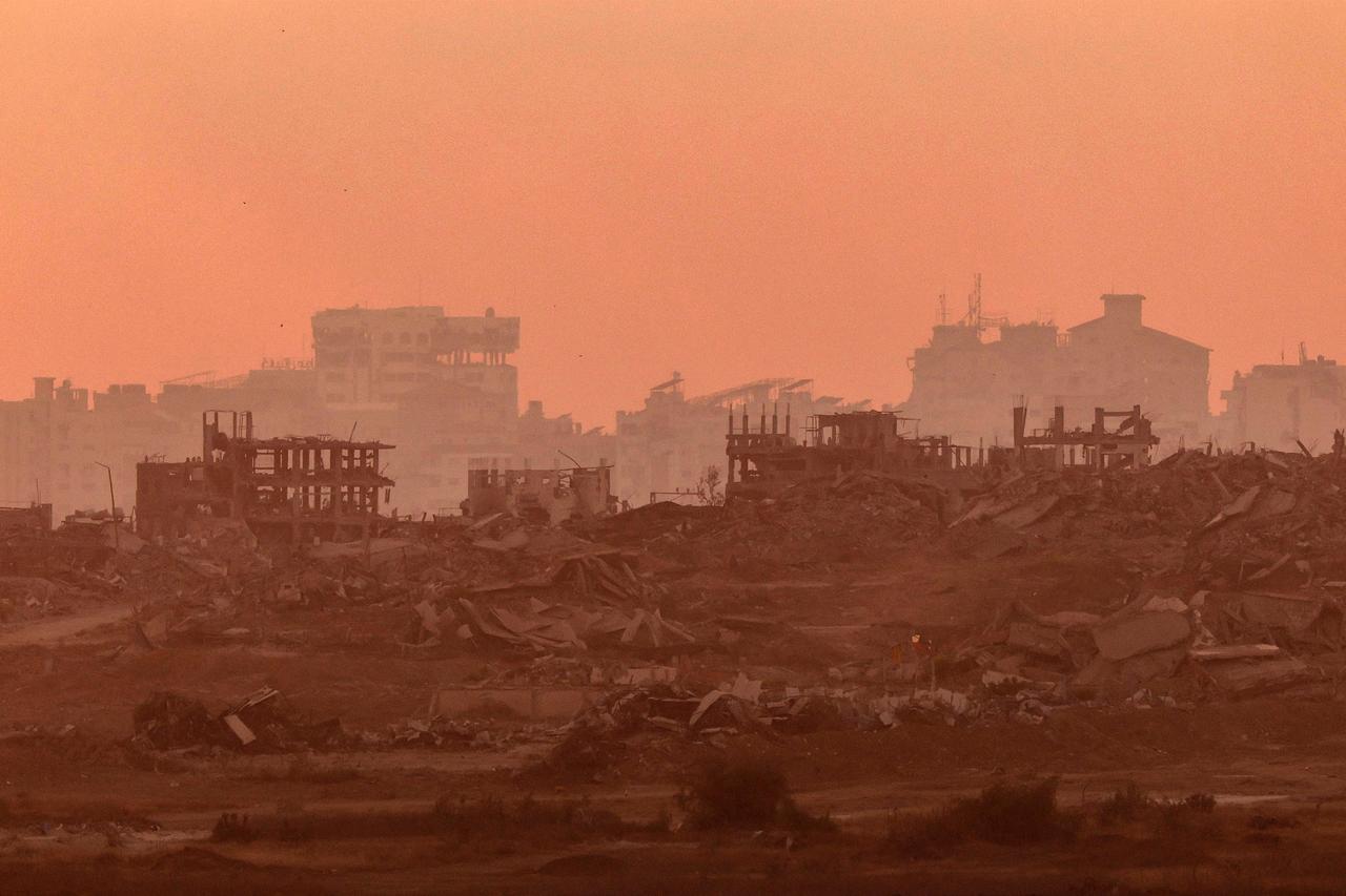 This picture, taken from a position on the Israeli border with the Gaza Strip, shows destroyed buildings in the besieged Palestinian territory on June 11, 2025. (AFP Photo)
