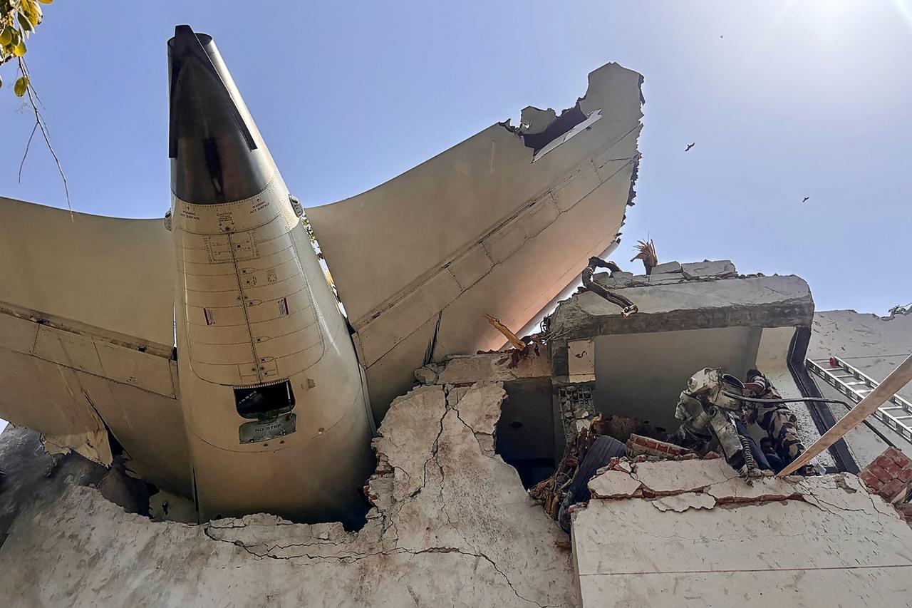 Back of an Air India plane after it crashed in a residential area near the airport in Ahmedabad on June 12, 2025. (AFP Photo) 