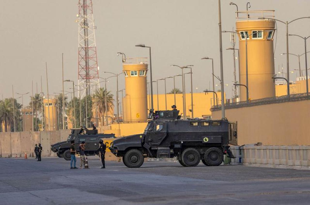 Iraqi security forces stand guard outside the US embassy in Baghdad, Iraq, accessed on June 12, 2025. (AFP Photo)
