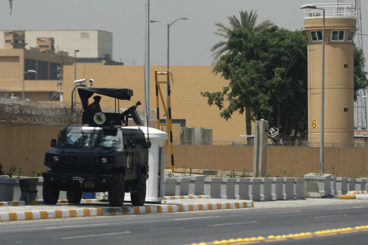 Armoured vehicles of the Iraqi Counter Terrorism Forces are deployed outside the U.S. embassy building in Baghdads Green Zone on June 12, 2025. (AFP Photo)