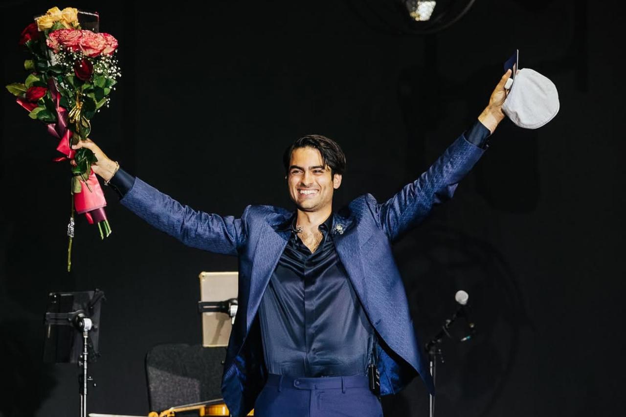 Matteo Bocelli thanks the audience with open arms after his performance in Lodz, Poland, June 2, 2025. (Photo via Instagram / @matteobocelli)