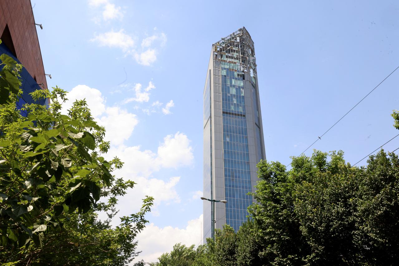This picture shows a building damaged in an Israeli strike on Tehran on June 13, 2025. Israel hit about 100 targets in Iran on June 13, including nuclear facilities and military command centres and killing senior figures including the armed forces chief and top nuclear scientists. (Photo by Atta KENARE / AFP)