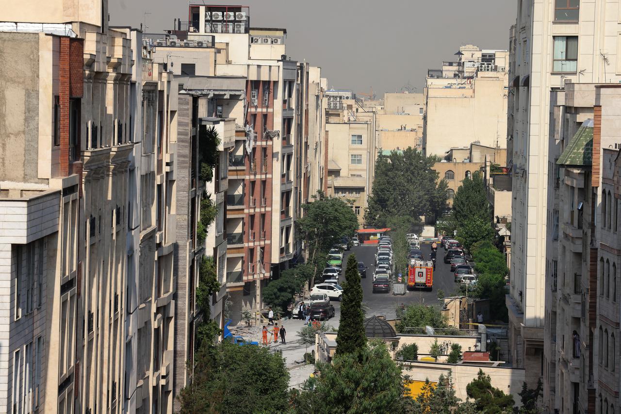 Rescue teams respond to Israeli strike on a Tehran neighborhood, Iran, June 13, 2025. (AFP Photo)