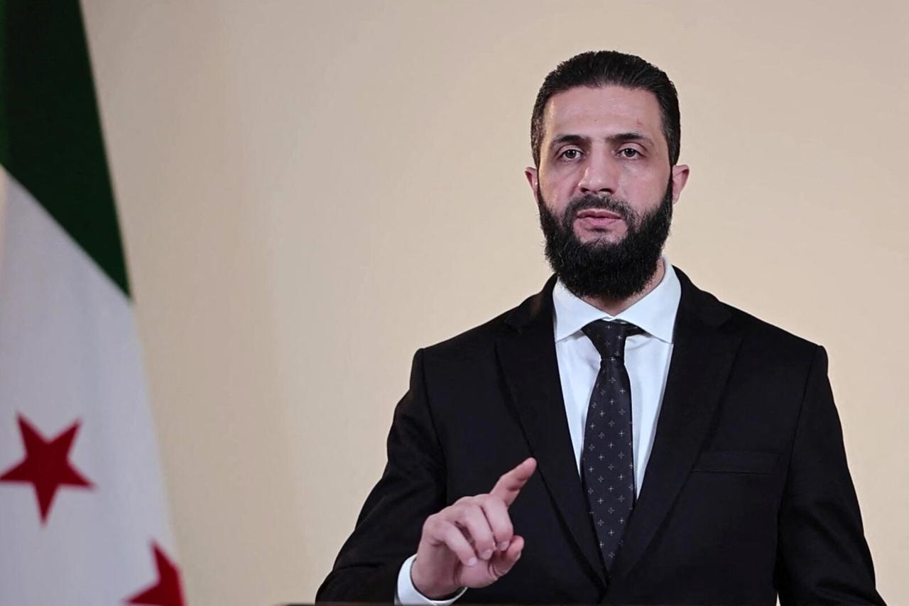 This grab from a handout video statement released by the Syrian Presidency shows Syrias interim president Ahmed al-Sharaa speaking in Damascus on March 9, 2025. (Photo by Syrian Presidency / AFP) 