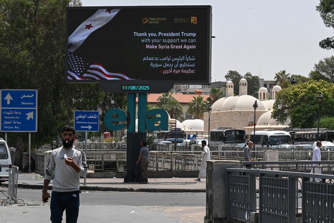 An advertisement billboard thanking US President Donald Trump is set up on a major roadway in Damascus on June 11, 2025. (AFP Photo)