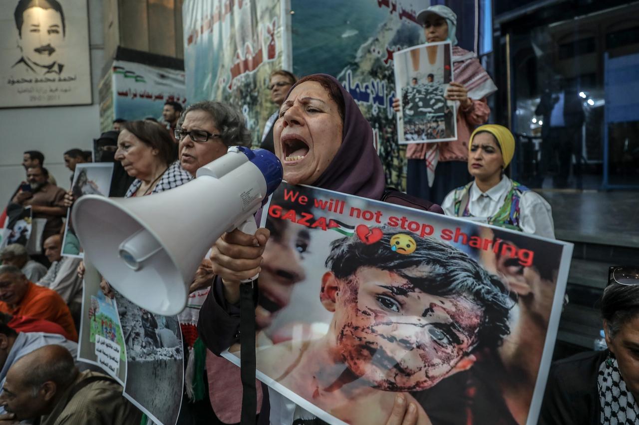 A large group of people demonstrate in support of the global marches on Gaza, gathering in front of the Egyptian Journalists Syndicate in Cairo, Egypt on June 12, 2025. (AA Photo)