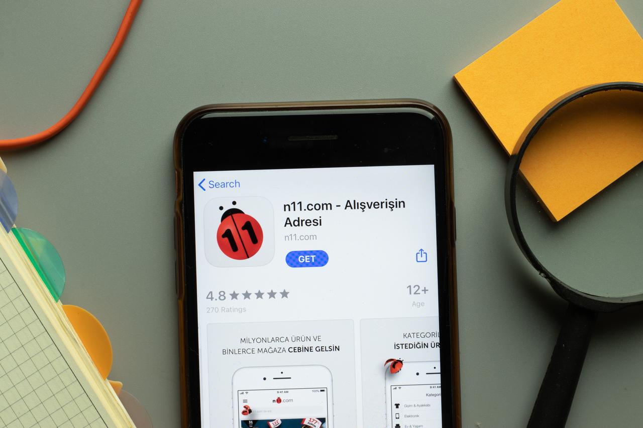 Photo shows n11 mobile app logo on phone screen close up, accessed on June 13, 2025. (Adobe Stock Photo)