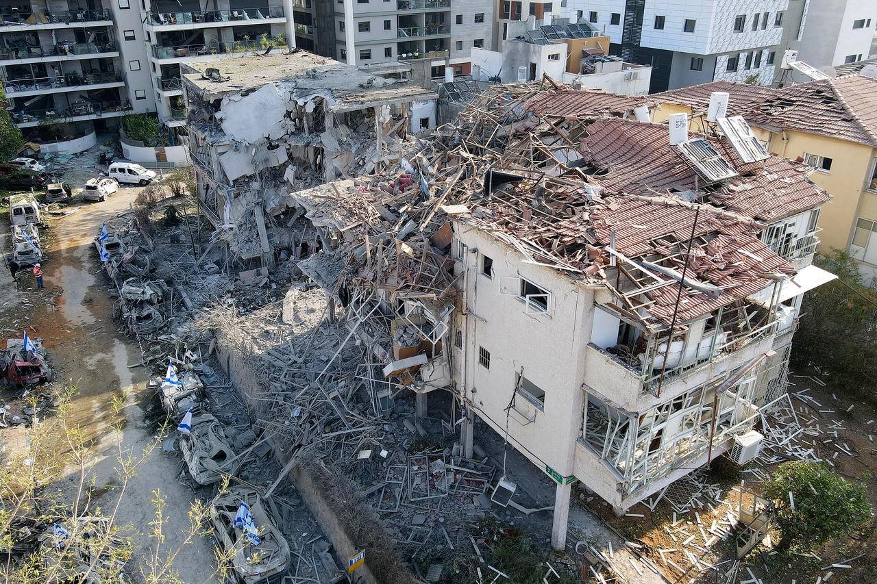 This aerial picture shows damaged buildings at a site hit by a missile fired from Iran in the Israeli city of Ramat Gan near Tel Aviv on June 14, 2025. (AFP Photo)