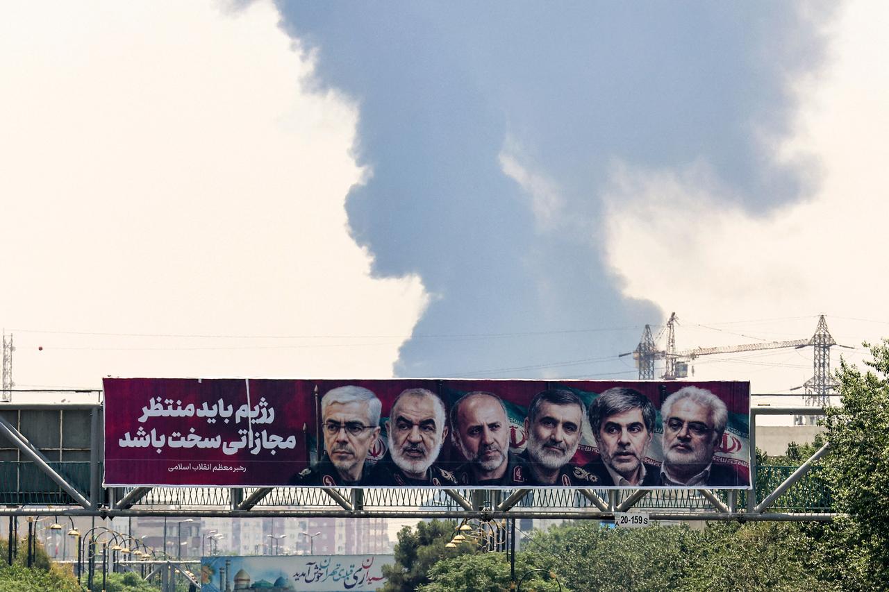 Plume of heavy smoke rises from an oil refinery in southern Tehran, after it was hit in an overnight Israeli strike, on June 15, 2025. (AFP Photo)