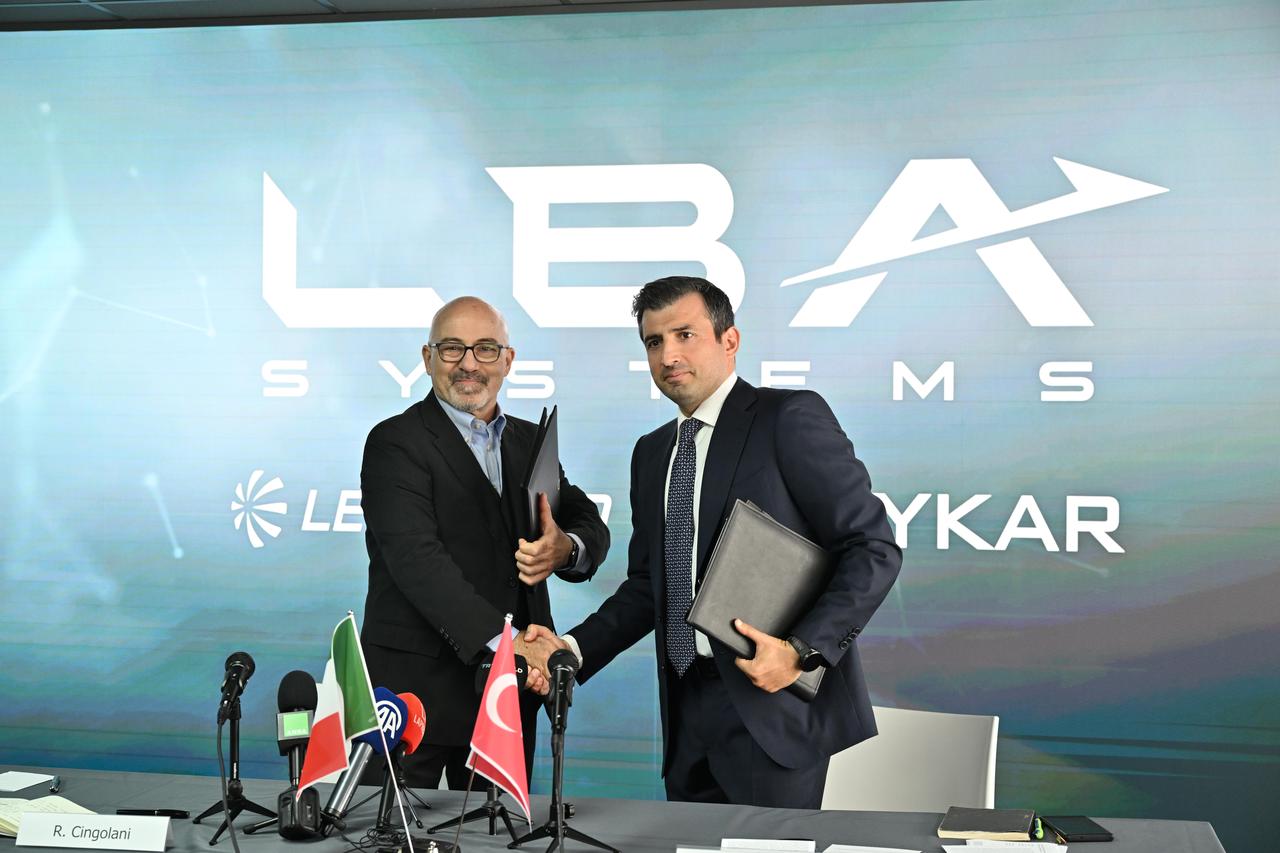 Baykar chairman Selcuk Bayraktar (R) and Leonardo CEO Roberto Cingolani (L) attend the signing ceremony of the joint venture between Baykar Technologies and Leonardo in Paris, France on June 16, 2025. (AA Photo)