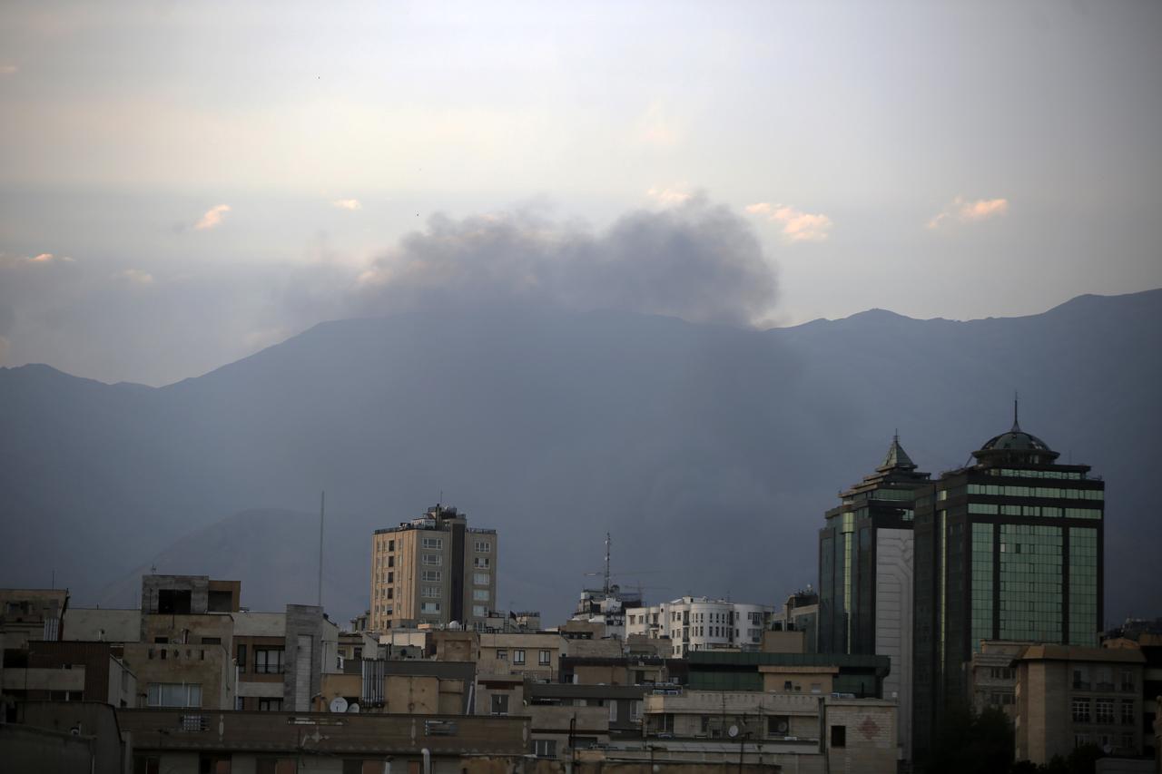 Smoke rises from the area where Israeli forces struck the Iranian state television building in Tehran, Iran on June 16, 2025. (AA Photo)