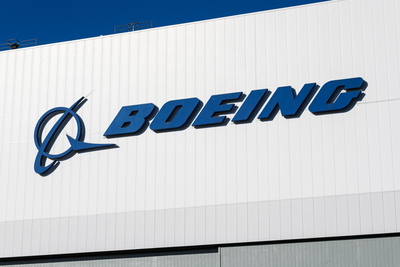 Boeing corporation logo on a white building in Seattle, US. (Adobe Stock Photo)
