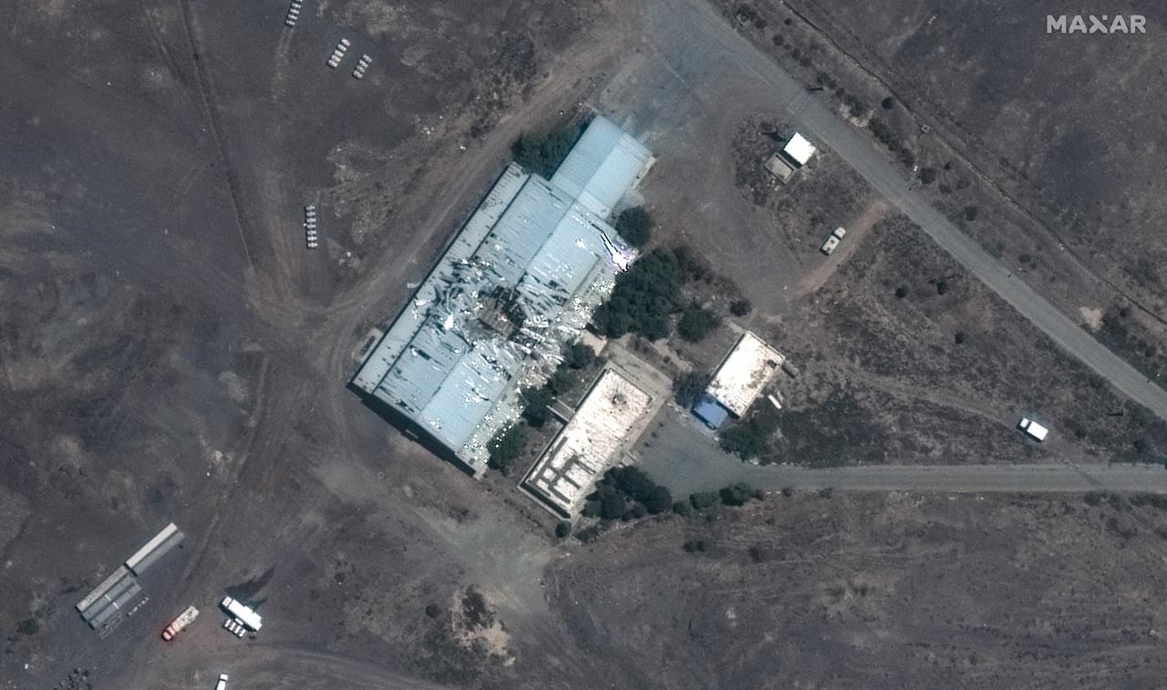 This handout satellite image released by Maxar Technologies on June 15, 2025, shows damaged buildings at the Bid Kaneh missile facility, southwest of Tehran, Iran on June 15, 2025. (Photo by Handout / Satellite image ©2025 Maxar Technologies / AFP)